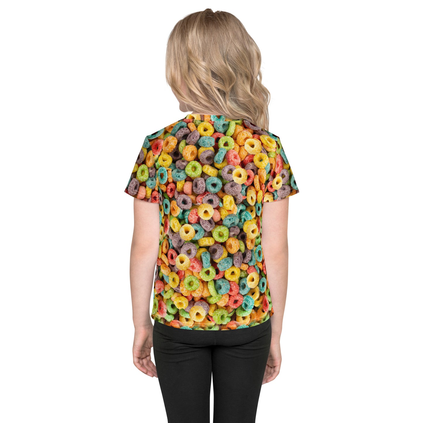 Little girl wearing an all over print Fruit Cereal Loops T-shirt, back view