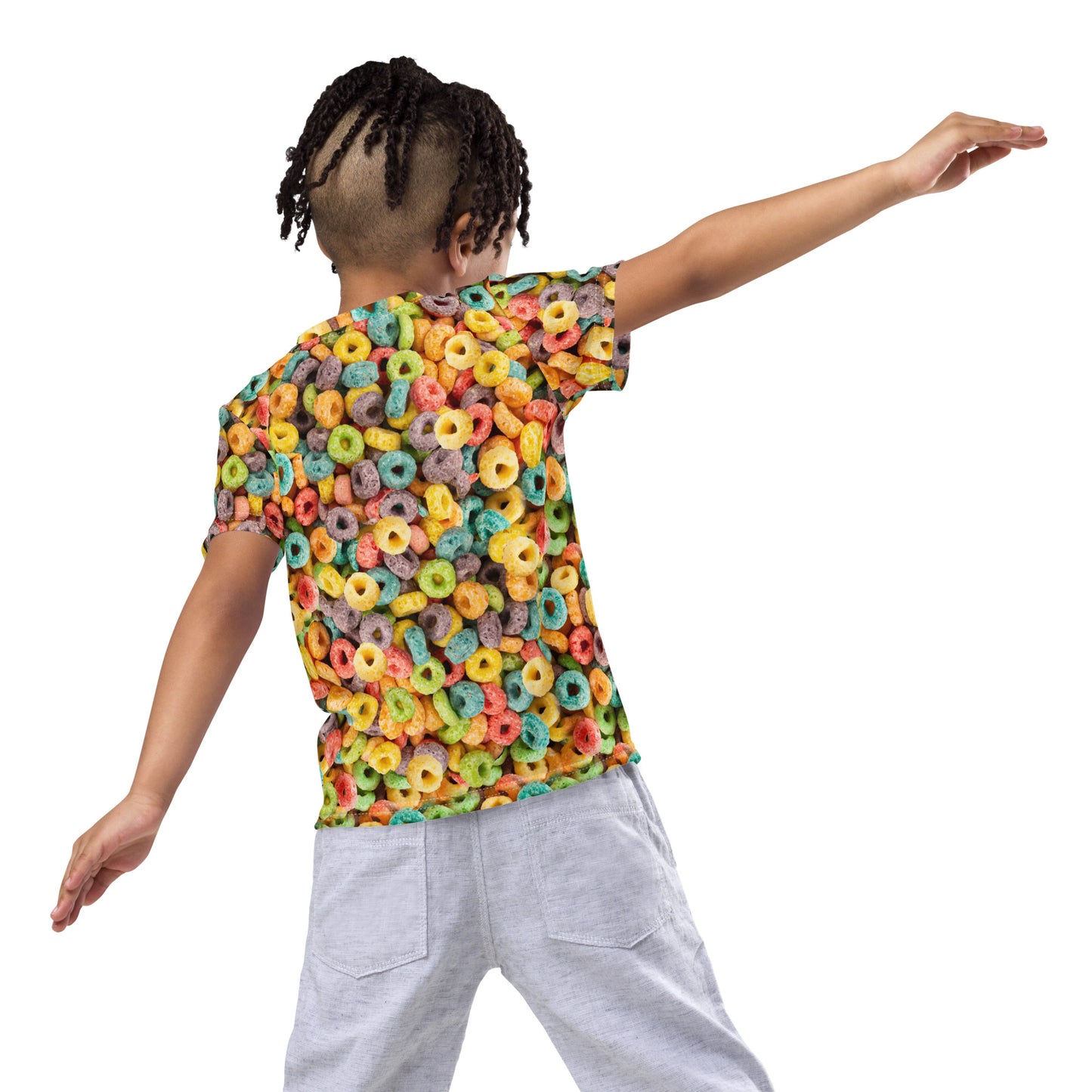 Little boy wearing an all over print Fruit Cereal Loops T-shirt, rear view