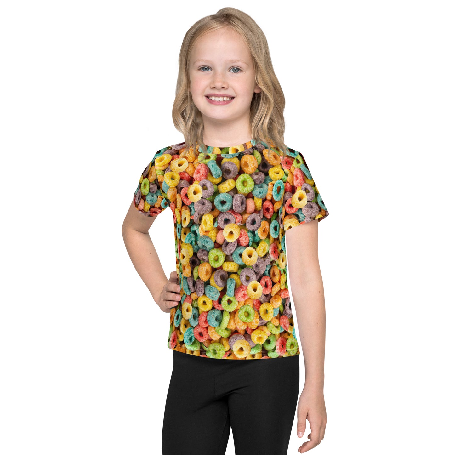 Little girl wearing an all over print Fruit Cereal Loops T-shirt, front view