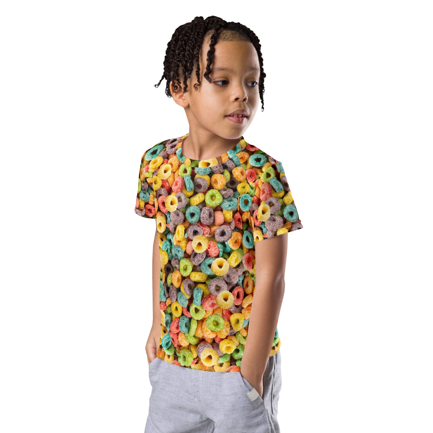 Little boy wearing an all over print Fruit Cereal Loops T-shirt, front left view