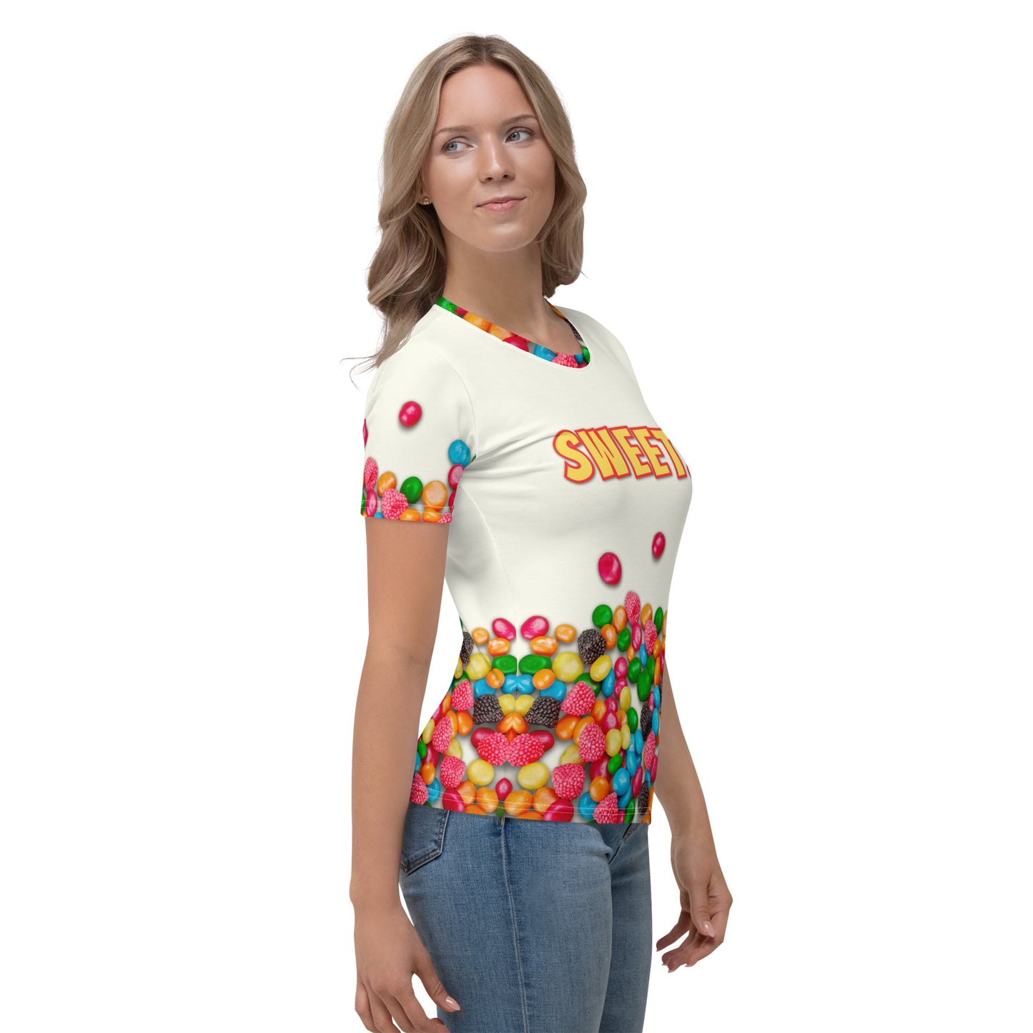 young woman wearing an all over print colourful Candy print T-shirt with SWEET! on the front, right side.