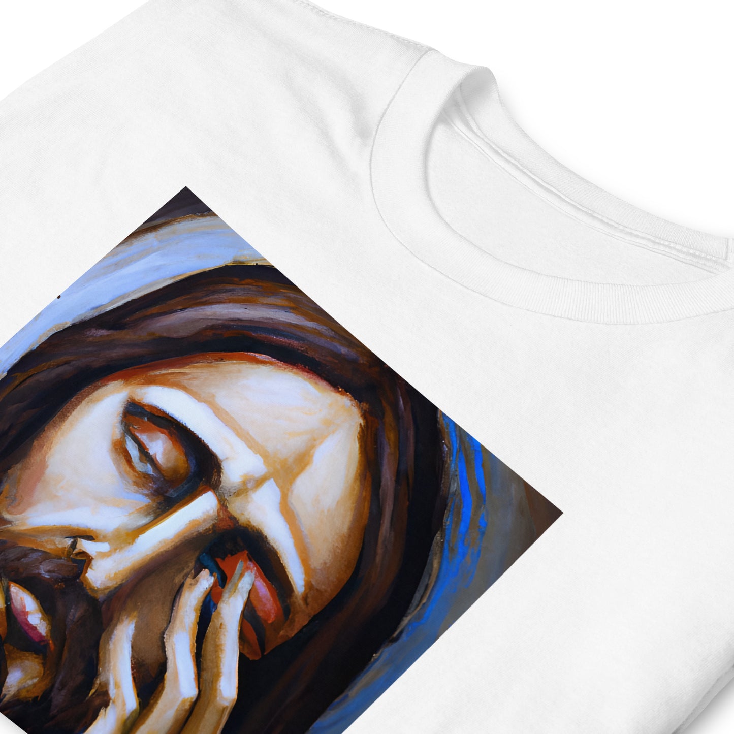 folded white t-shirt with a graphic of Jesus with his hand over his face that reads I never said that