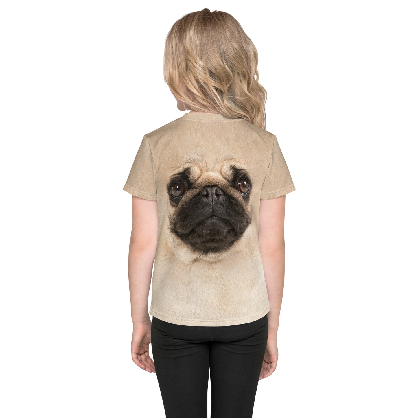 Little gisrl showing the back of her pug face all over print T-shirt, featuring a second Pug face.