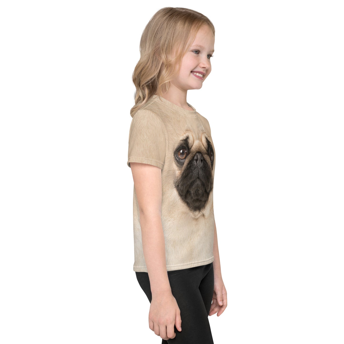 Little girl facing to her left wearing the pug face all over print T-shirt.