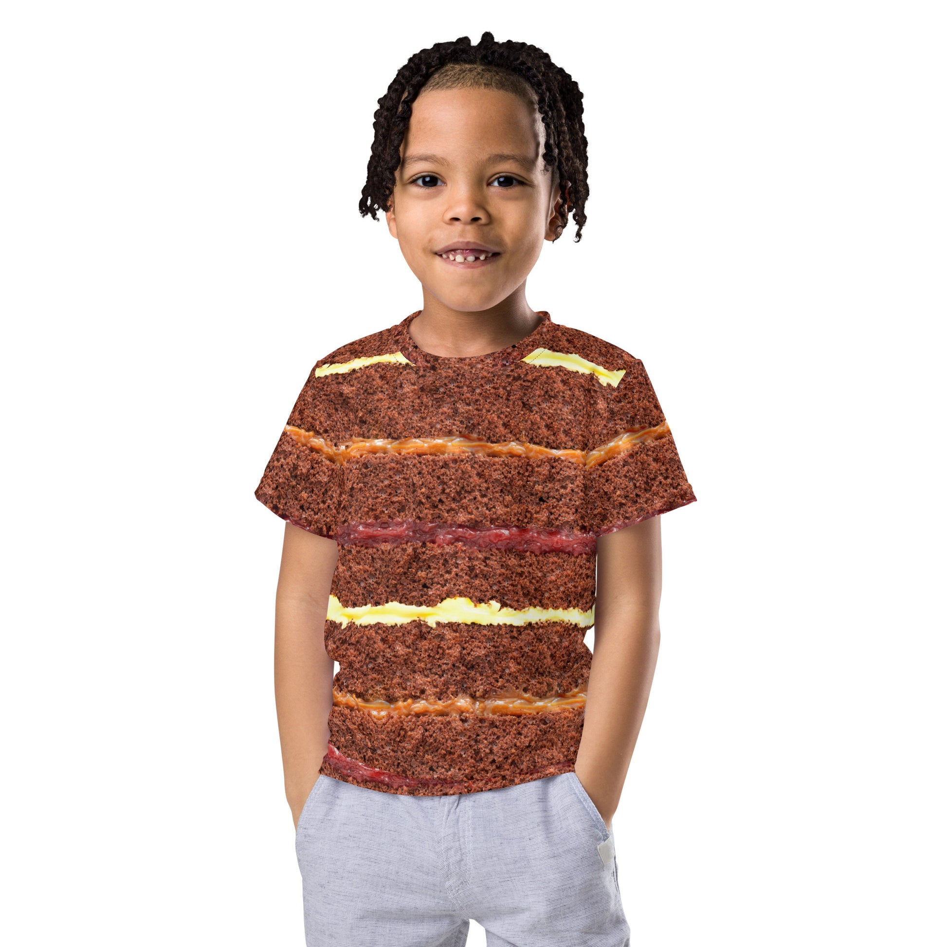 Little boy wearing chocolate cake layers all over print kid's T-shirt front view