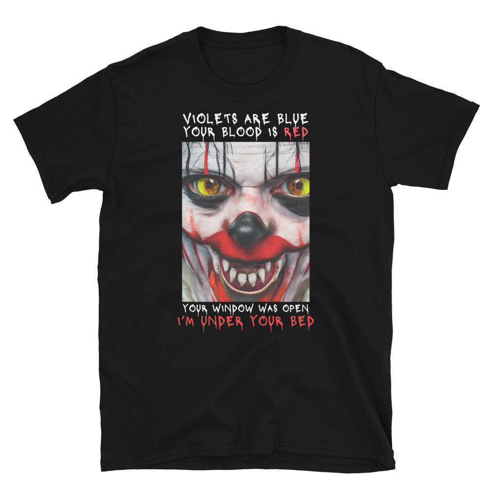 Scary Clown Halloween T shirt that shows a creepy clowns face with text that reads Violets are blue, your blood is red, your window was open, I'm under your bed. Black T shirt laid flat.