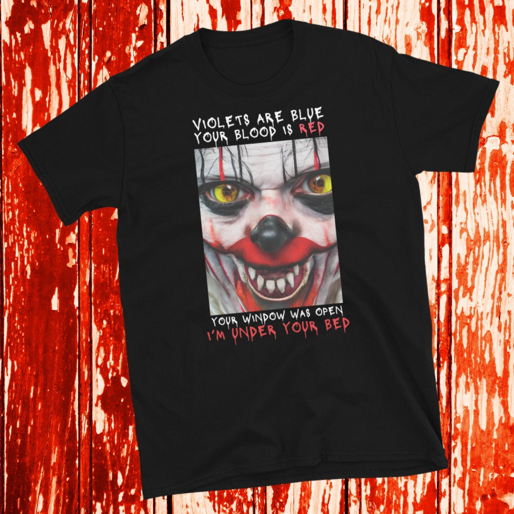 Scary Clown Halloween T shirt that shows a creepy clowns face with text that reads Violets are blue, your blood is red, your window was open, I'm under your bed