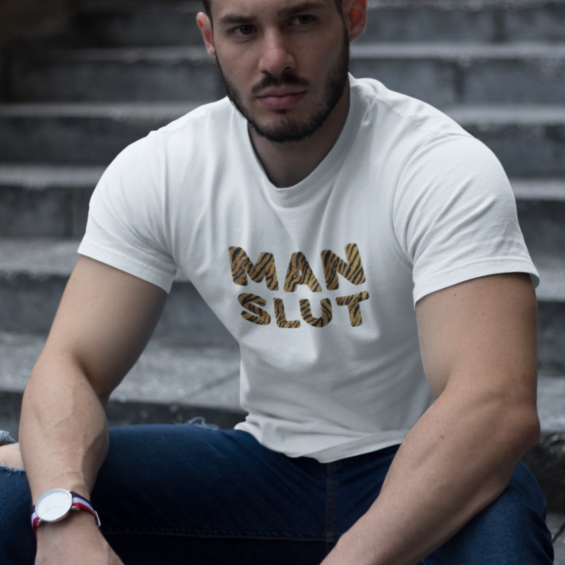 Muscular male wearing a funny Man Slut T-shirt with Tiger Fur Printed Letters