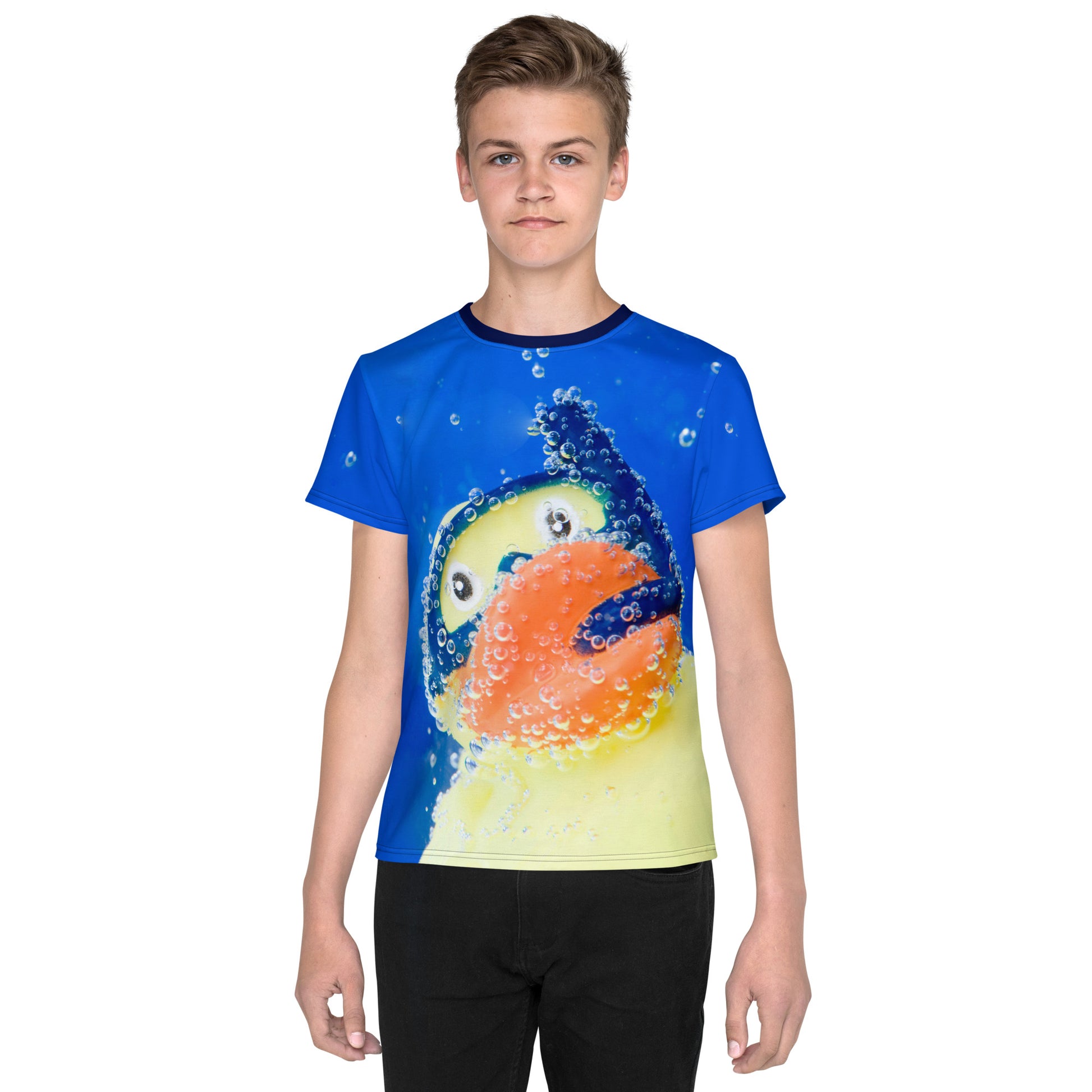 Teenage boy wearing an All over print Rubber Duck Snorkelling Underwater T-shirt, facing front.