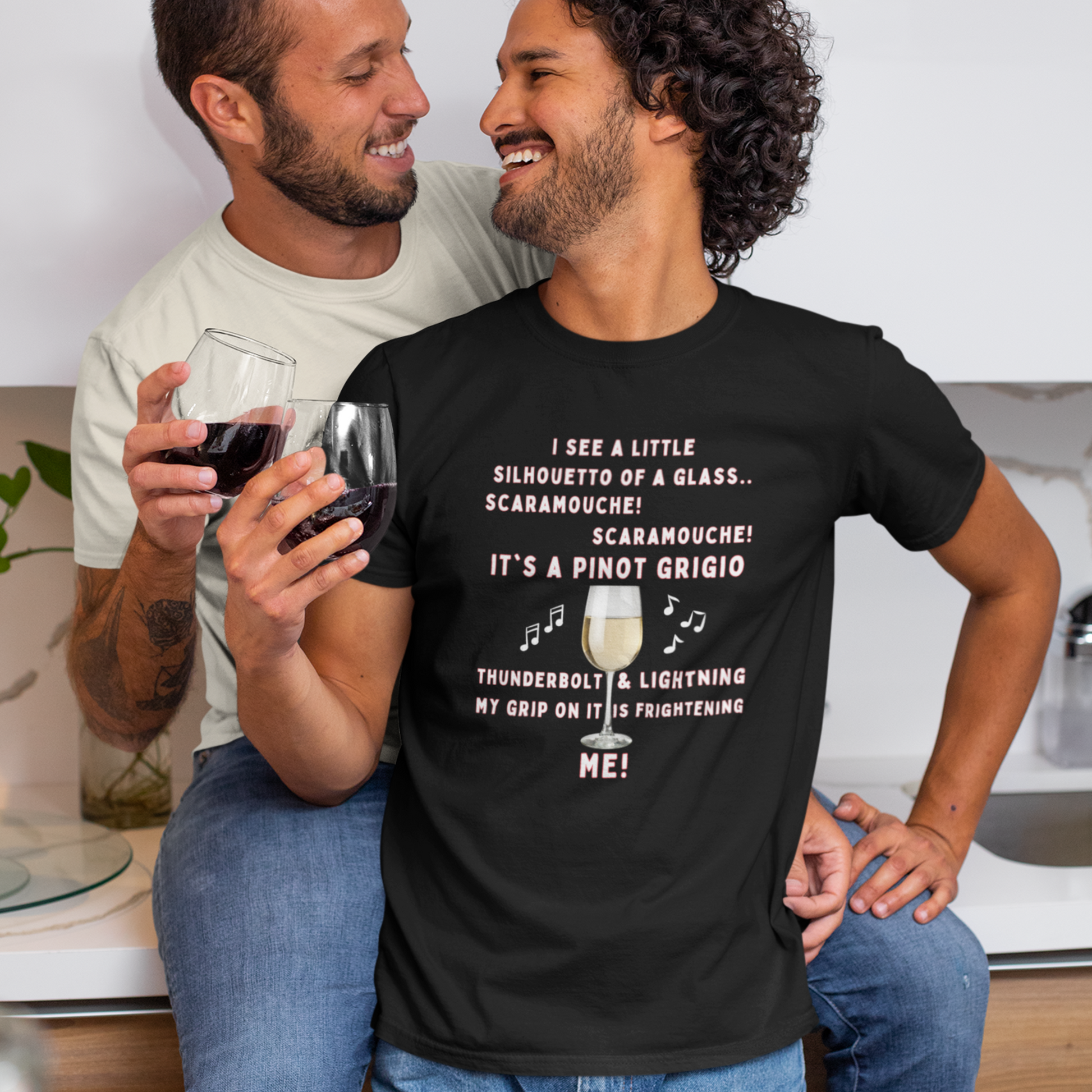 Two young men drinking wine with one wearing a Funny Black Bohemian Rhapsody Spoof T-shirt about Wine