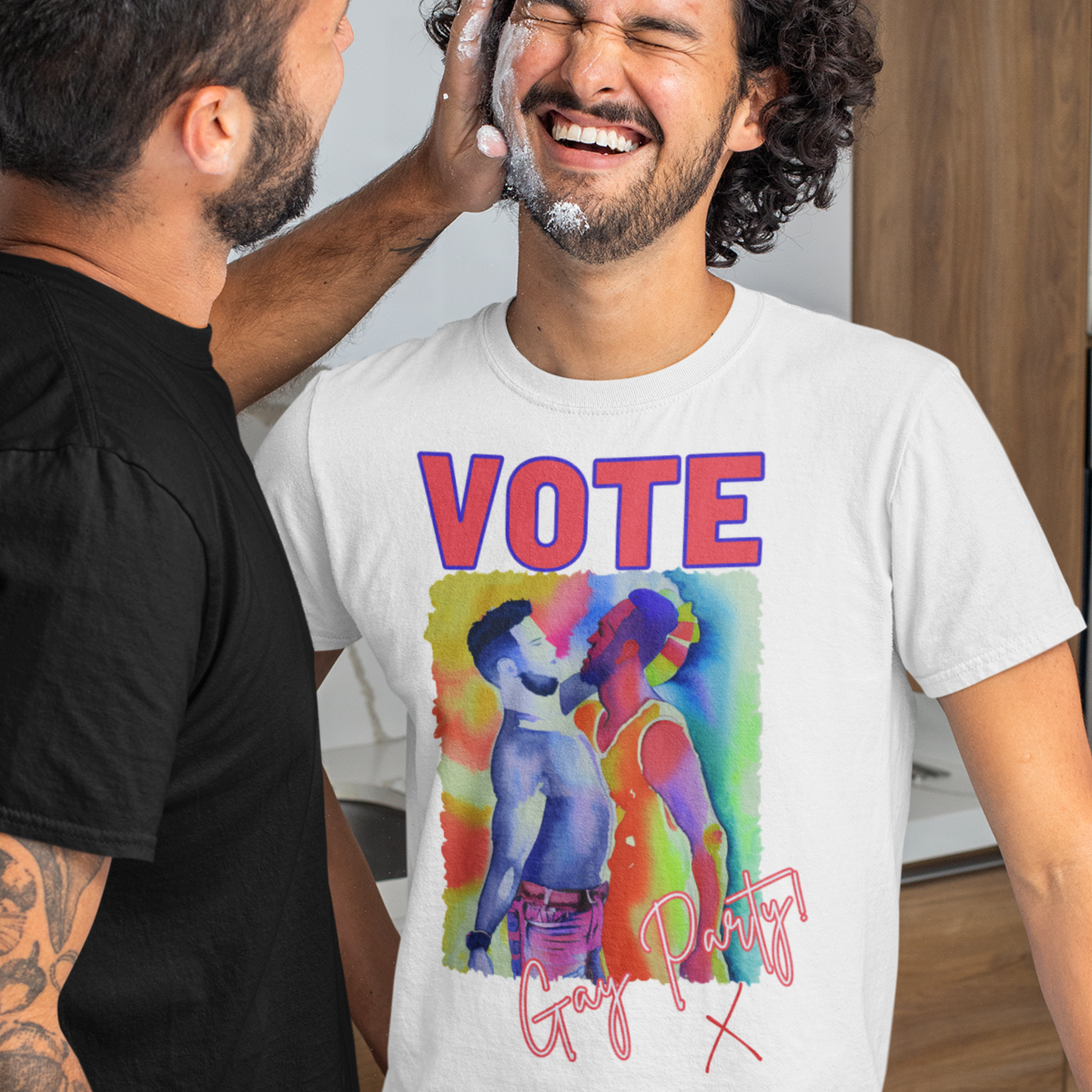 Male model wearing a white funny VOTE GAY PARTY! T-shirt with an image of two men dancing 