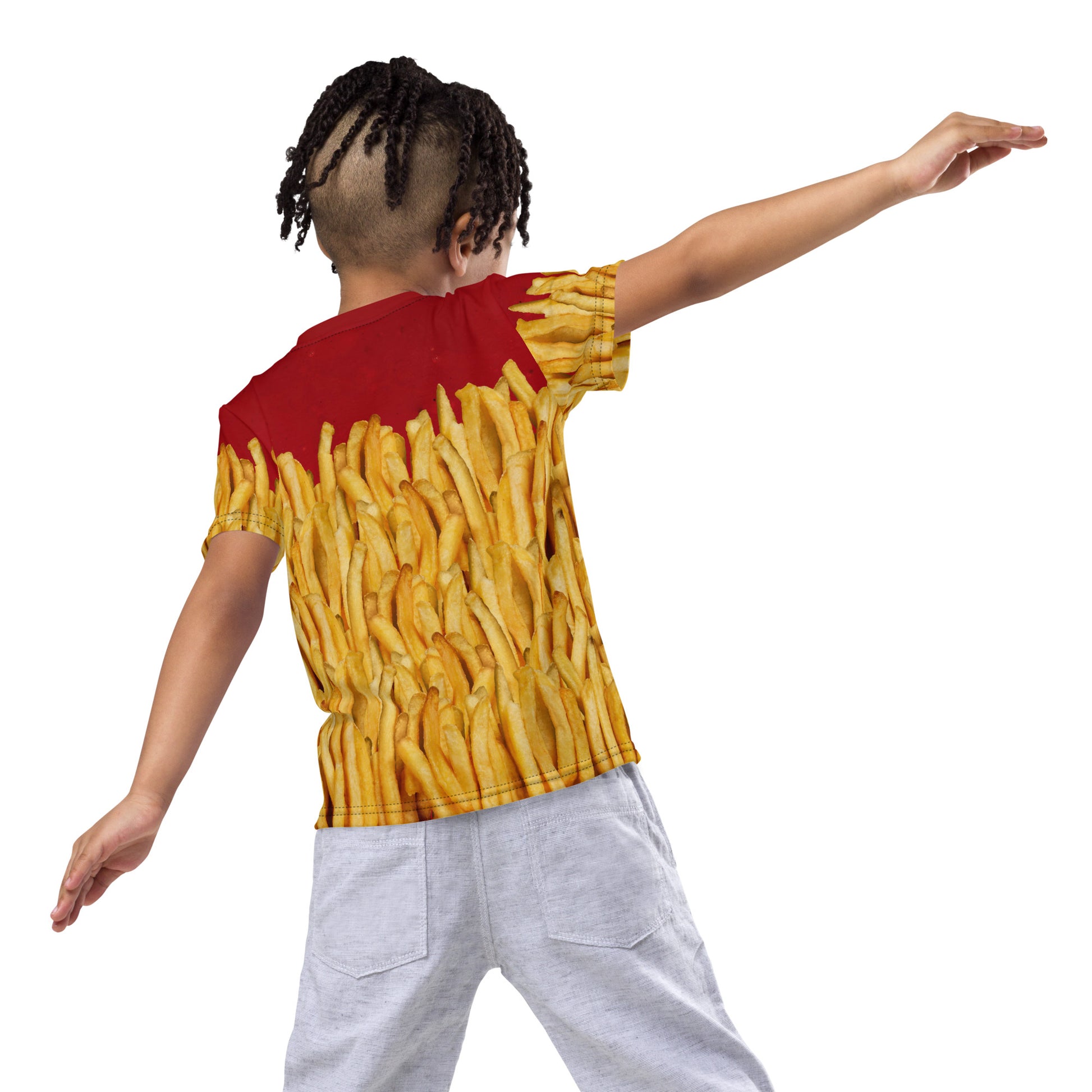 Little boy wearing a french fries and ketchup all over print T-shirt, rear view