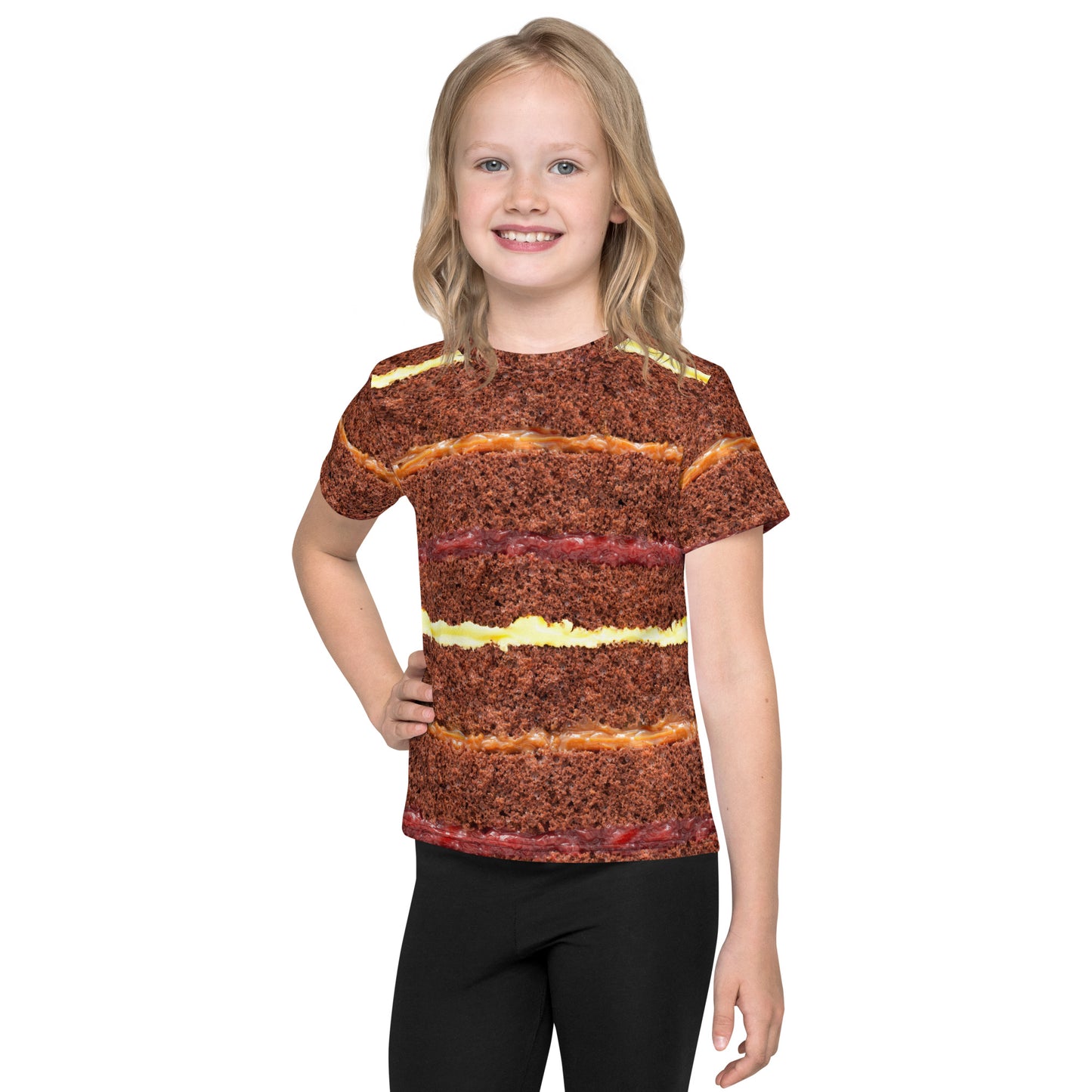 Little girl wearing chocolate cake layers all over print kid's T-shirt front