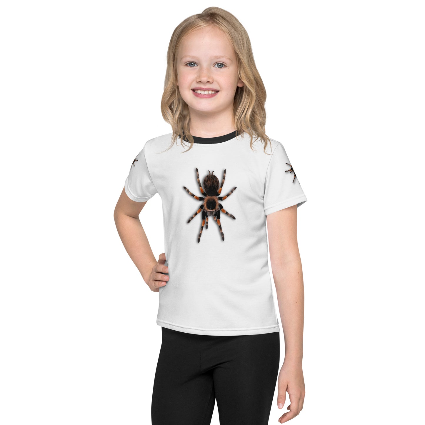 Little girl wearing a 3D Tarantula spider T-shirt with one spider on each arm, front and back of shirt. Facing forwards.