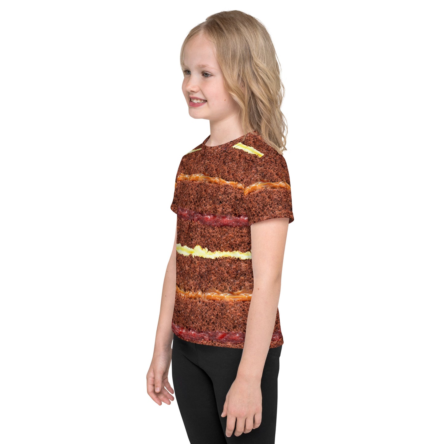 Little girl wearing chocolate cake layers all over print kid's T-shirt left side