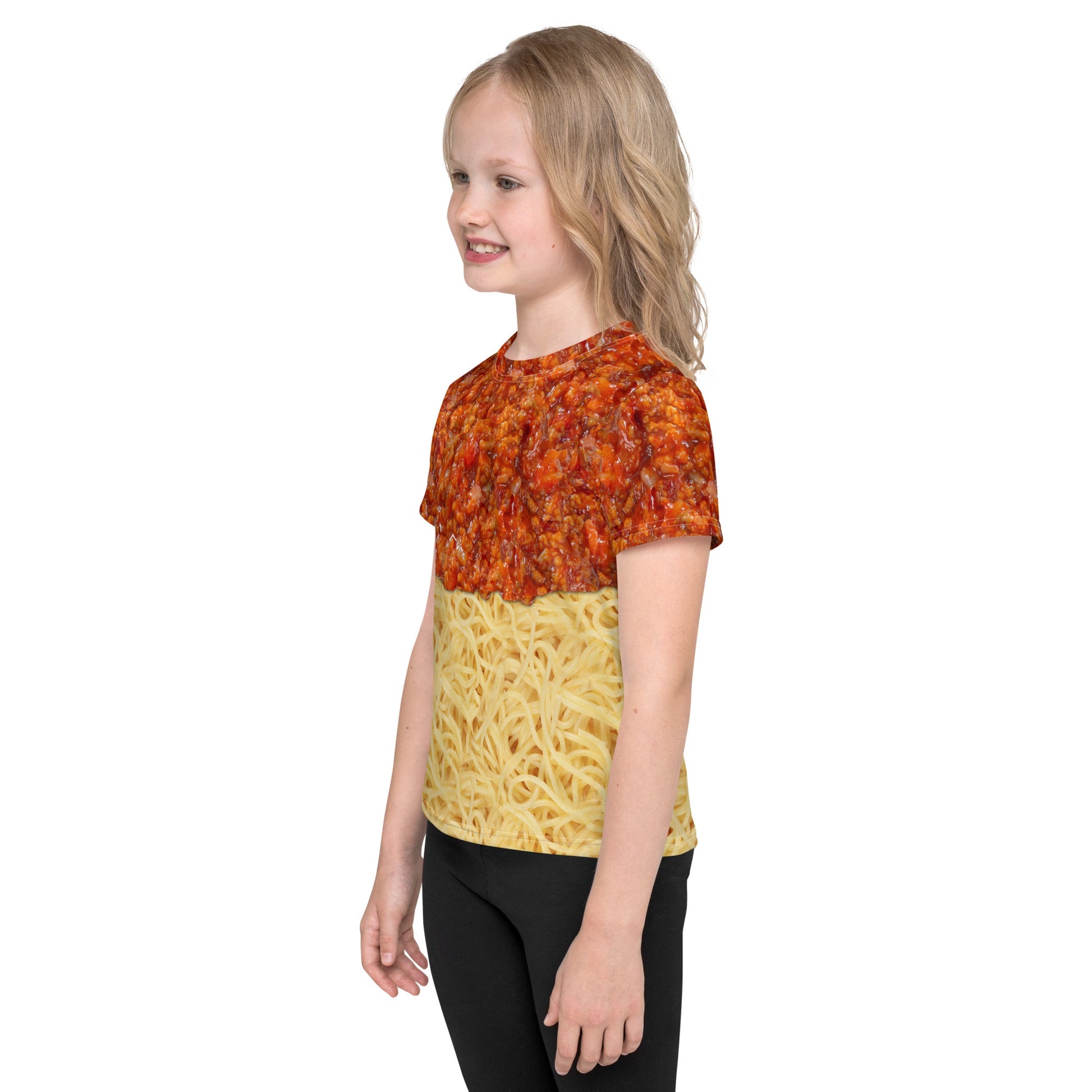 Little girl wearing a kid's spaghetti bolognese all over print T-shirt, front left view.