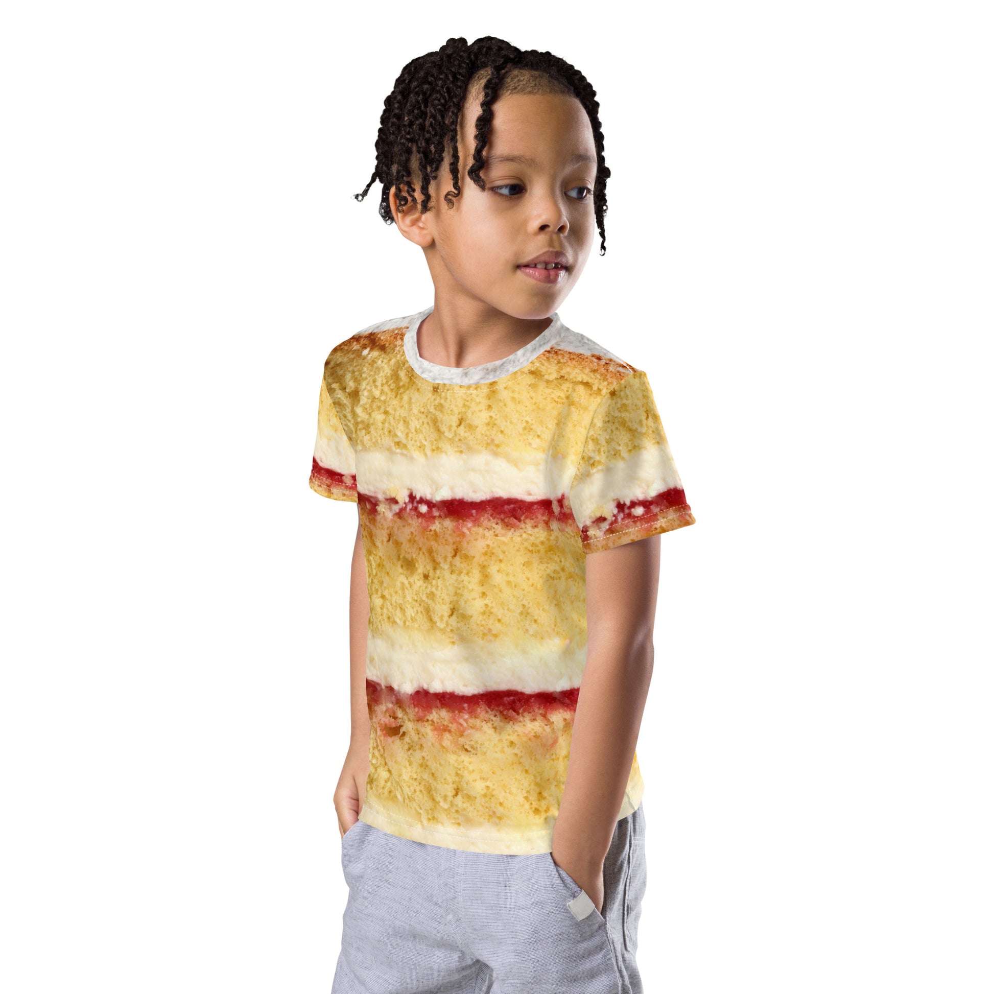 Boy wearing Victoria sponge cake layers with fresh cream and jam, all over print kid's T-shirt front left view