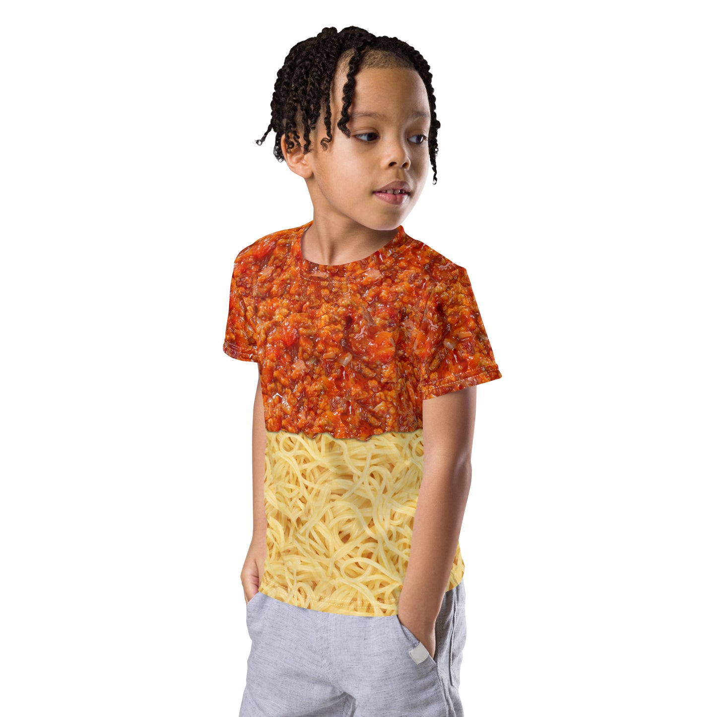 Little boy wearing a kid's spaghetti bolognese all over print T-shirt, front left view.