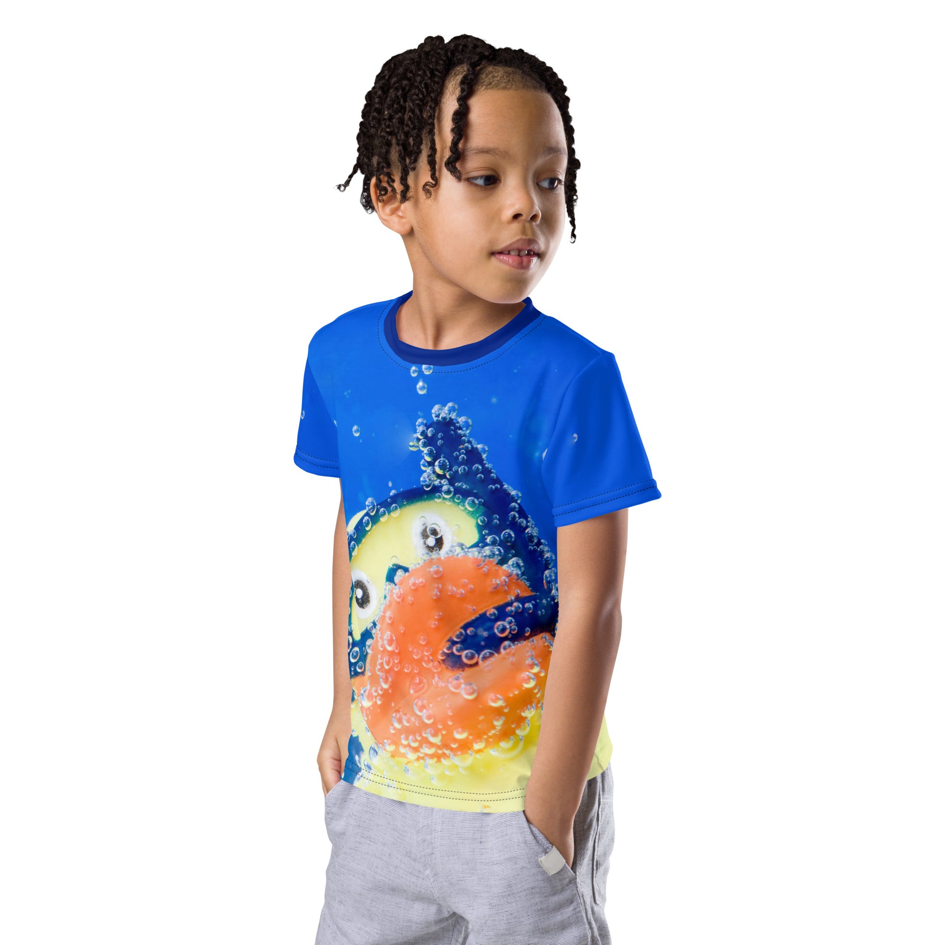 little boy wearing an All over print Rubber Duck Snorkelling Underwater T-shirt, front left view.