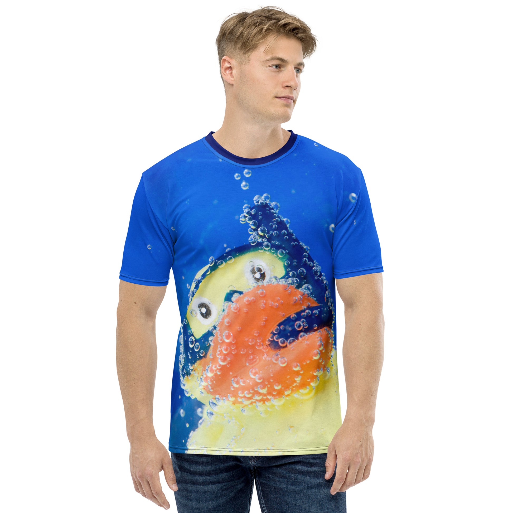 Young man wearing an All over print Rubber Duck Snorkelling Underwater T-shirt, front.