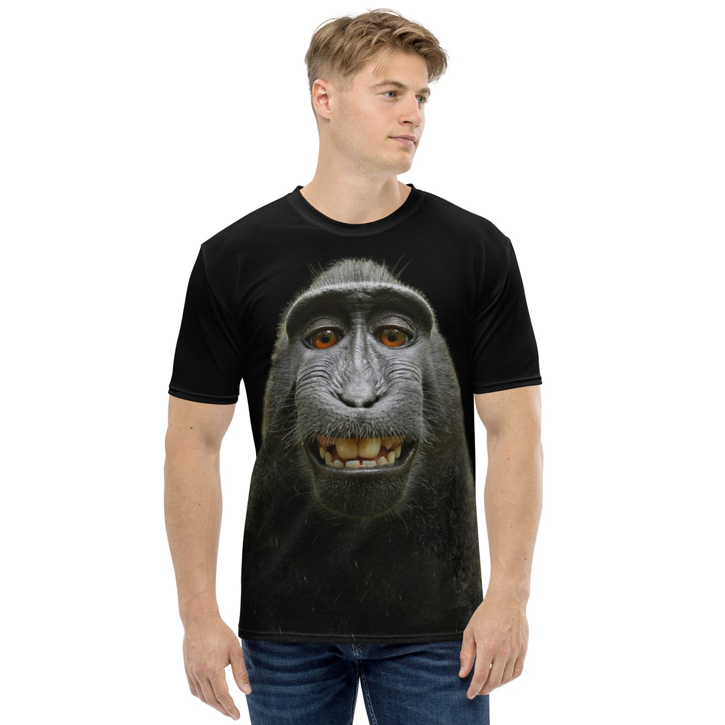 Young man wearing a Funny monkey face all over print men's T-shirt, front view.