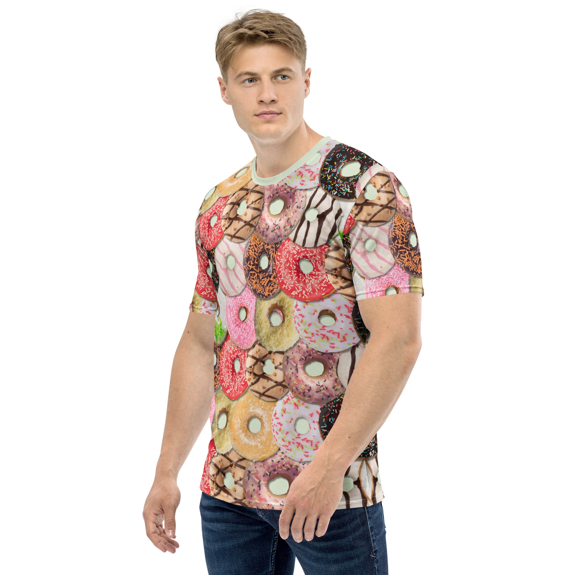 Young man wearing a Men's all over print Iced Doughnuts T-shirt, front left side.