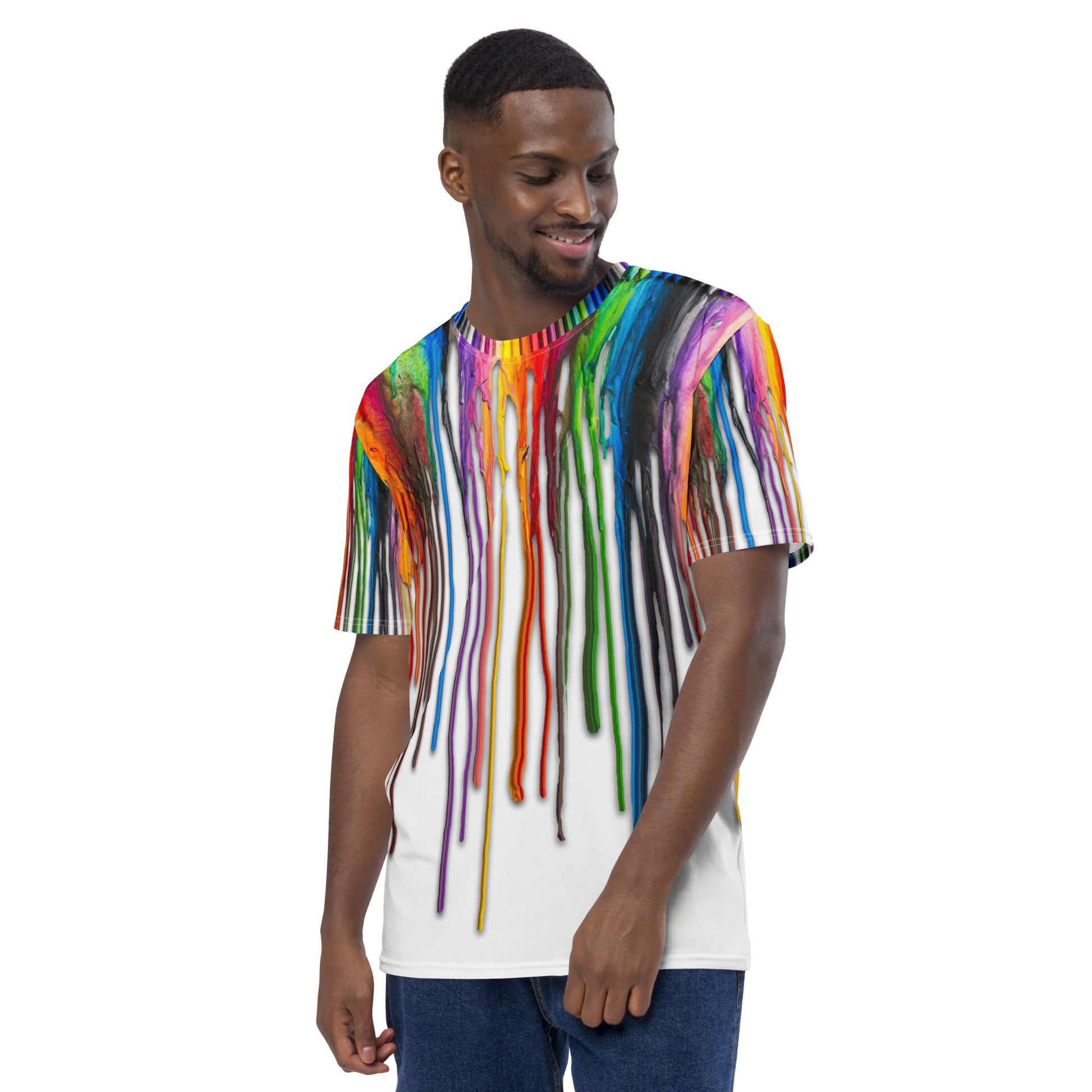 Young man wearing an All over print Melted Crayons Dripping down the shirt T-shirt, front left angle.