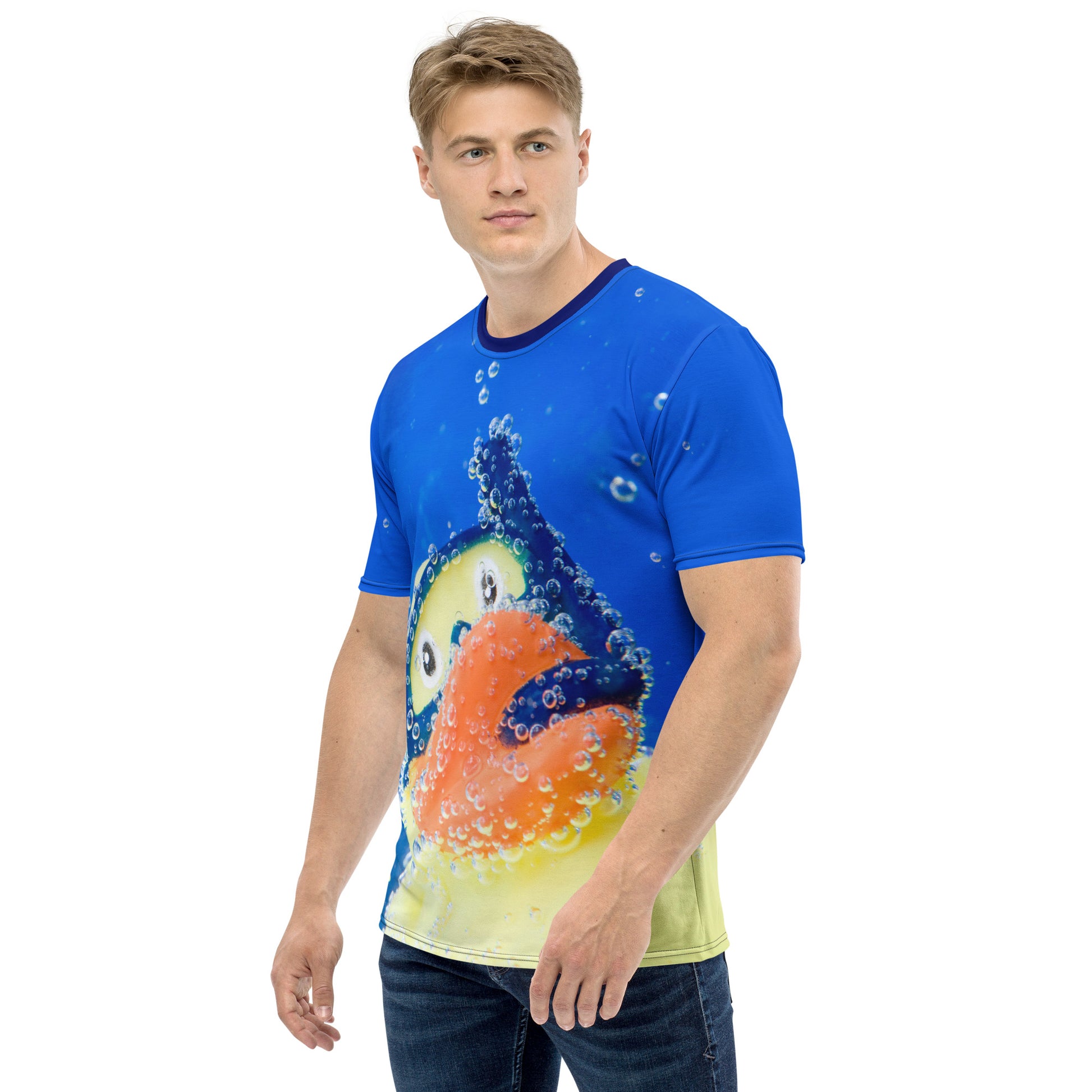 young man wearing an All over print Rubber Duck Snorkelling Underwater T-shirt, front left view.