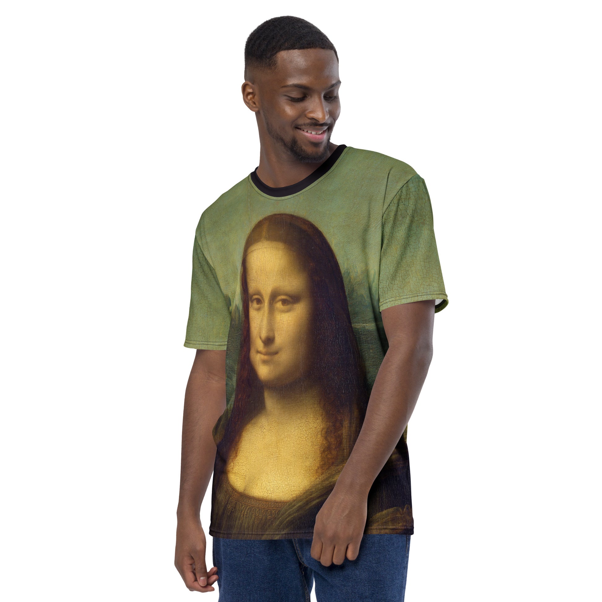 Young man modelling a Mona Lisa Smile all over print Novelty T-shirt, left front view.