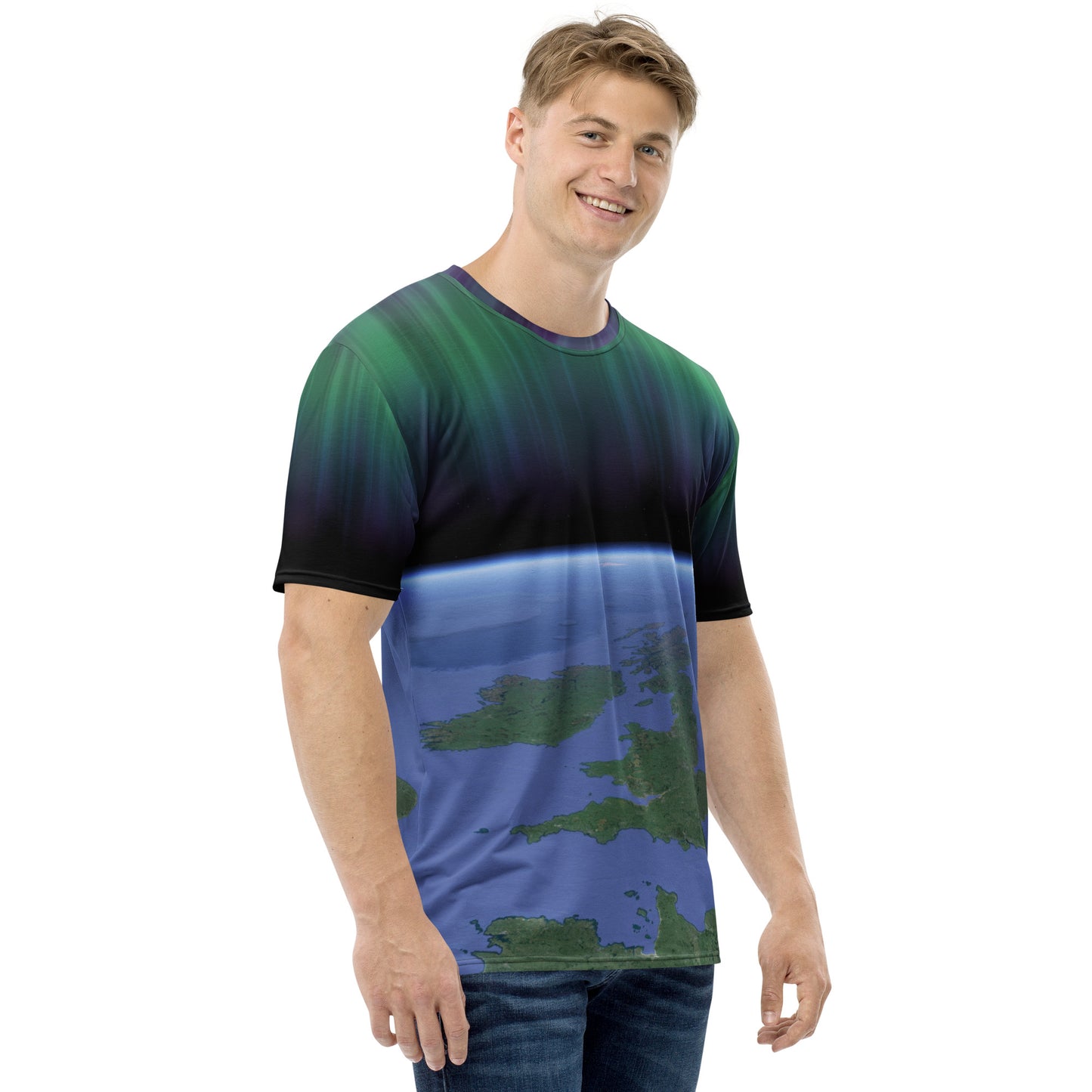 male model wearing an all over print Northern lights over the British Isles T-shirt, front right view