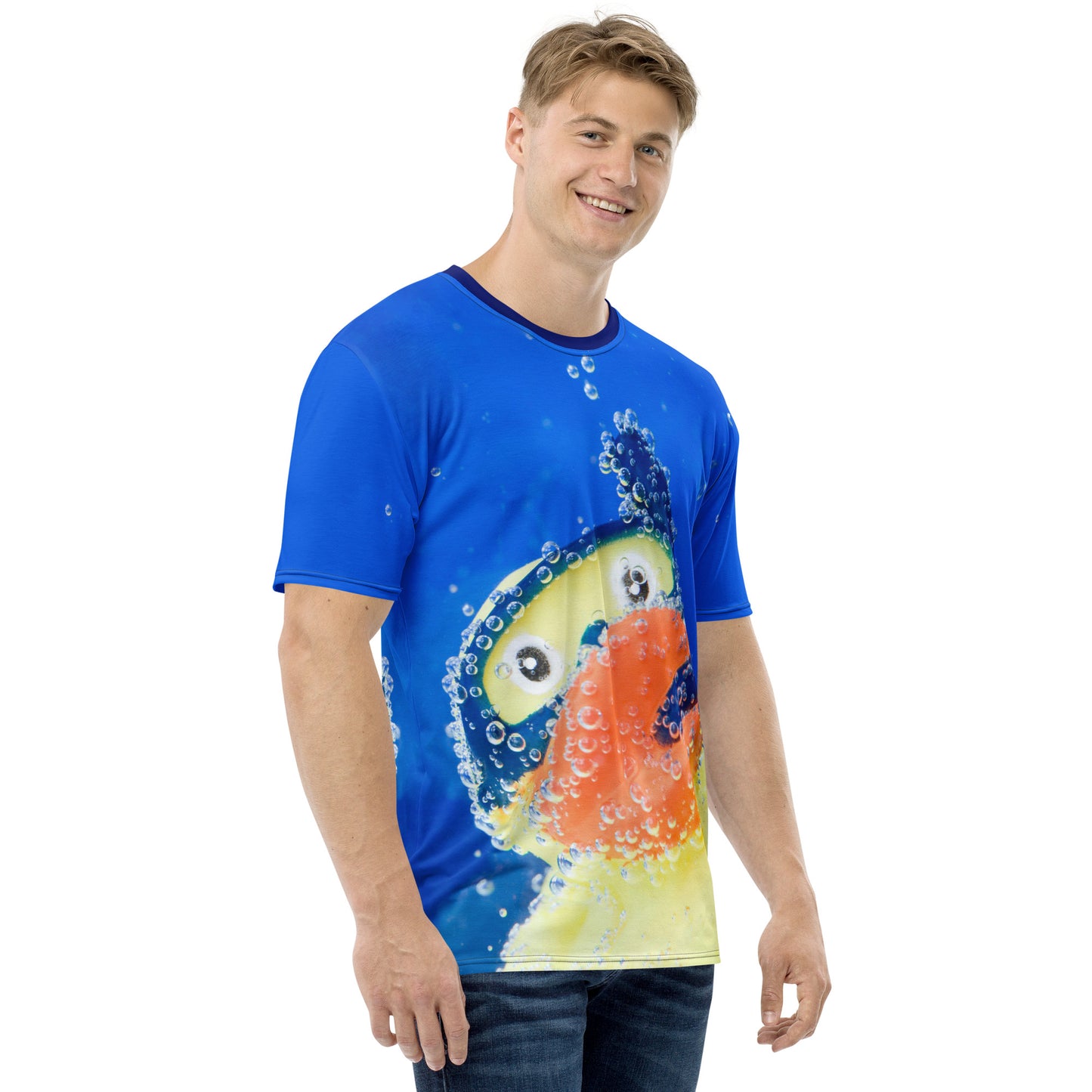 Young man wearing an All over print Rubber Duck Snorkelling Underwater T-shirt, front right view.