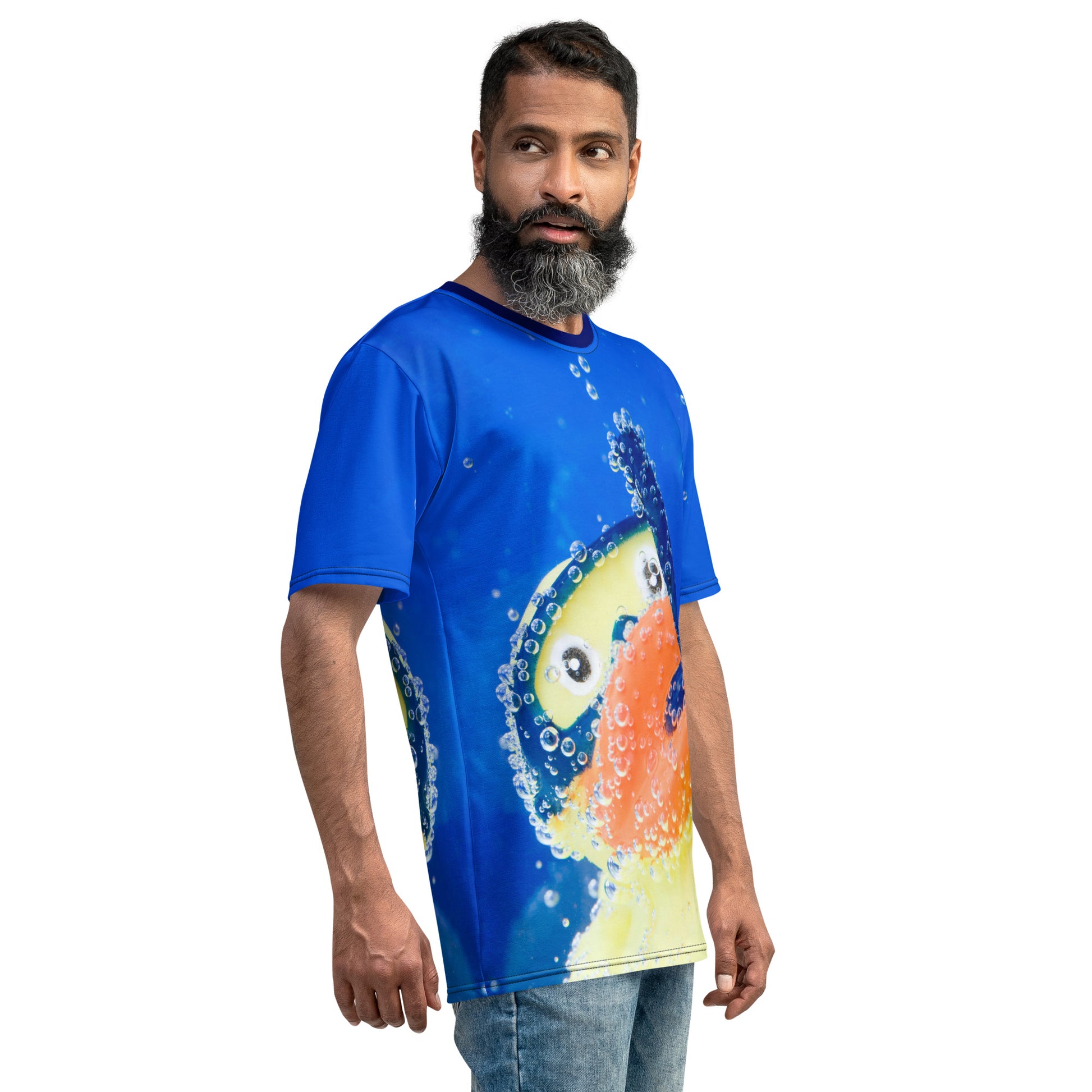 older man wearing an All over print Rubber Duck Snorkelling Underwater T-shirt, right side view.