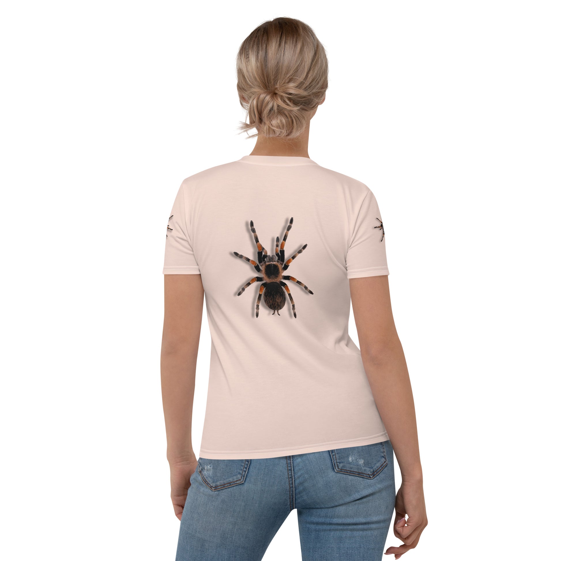 woman wearing a pale pink t-shirt with realistic looking 3D Tarantula spiders on both arms, back and front, rear view