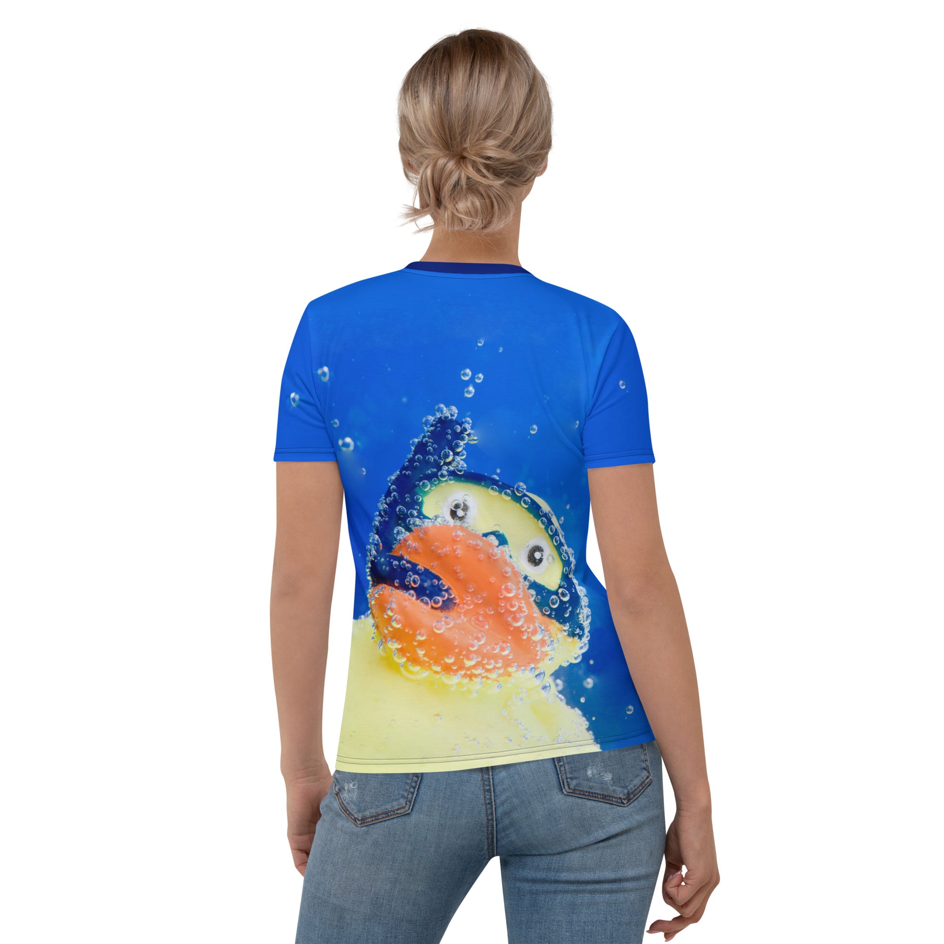 Young woman wearing an all over print Rubber Duck Snorkelling Underwater T-shirt, rear view.