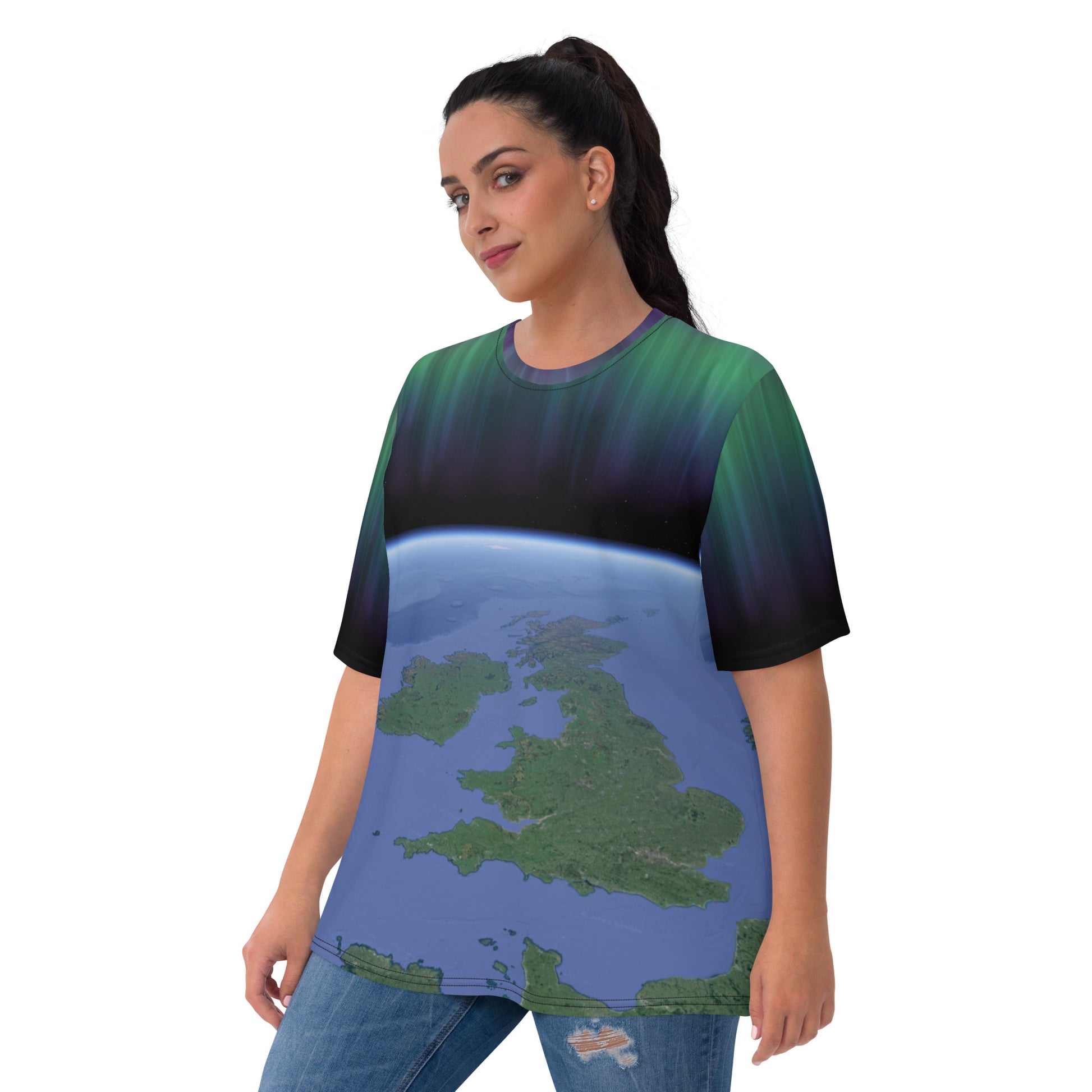 plus size woman wearing a t-shirt showing the British Isles from space with the aurora borealis above, front view