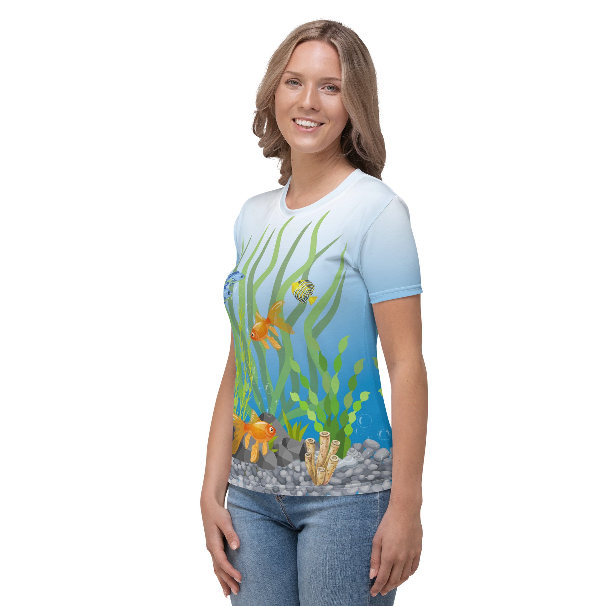 Woman wearing a tropical fish aquarium scene all over print T-shirt. Front left view.