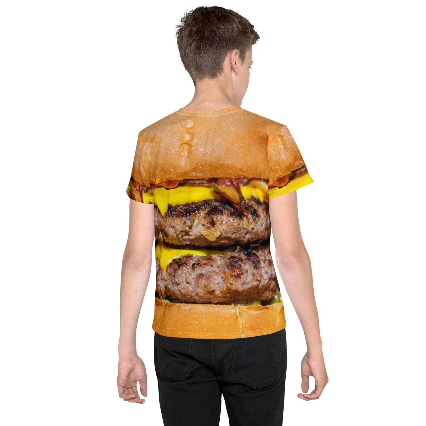 Boy wearing cheeseburger all over print T-shirt, rear view