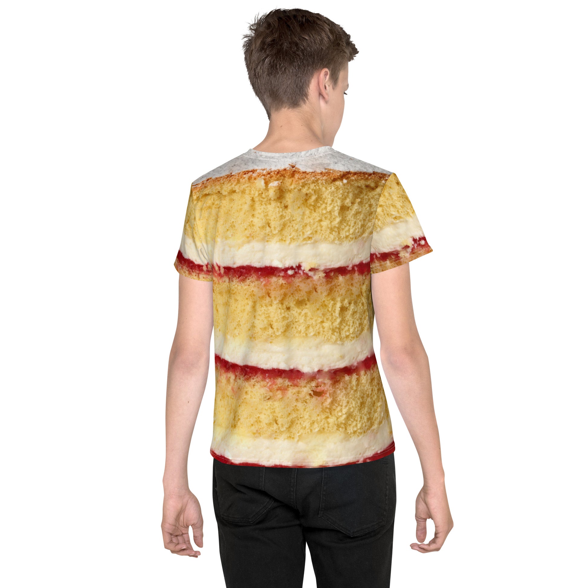 Teenage boy wearing a Victoria Sponge Cake layers all over print T-shirt, rear view