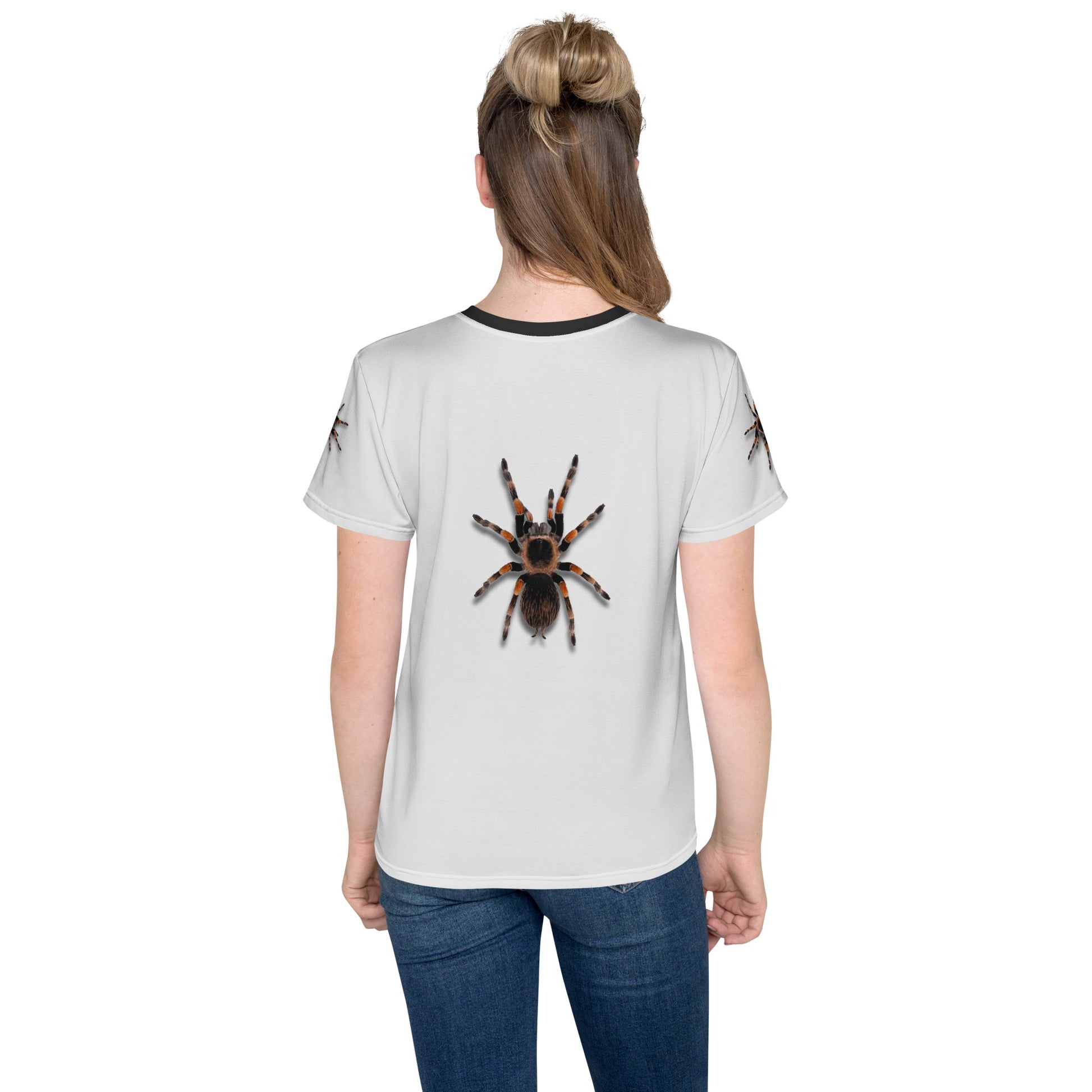 Teenage girl wearing a 3D Tarantula spider T-shirt, rear view