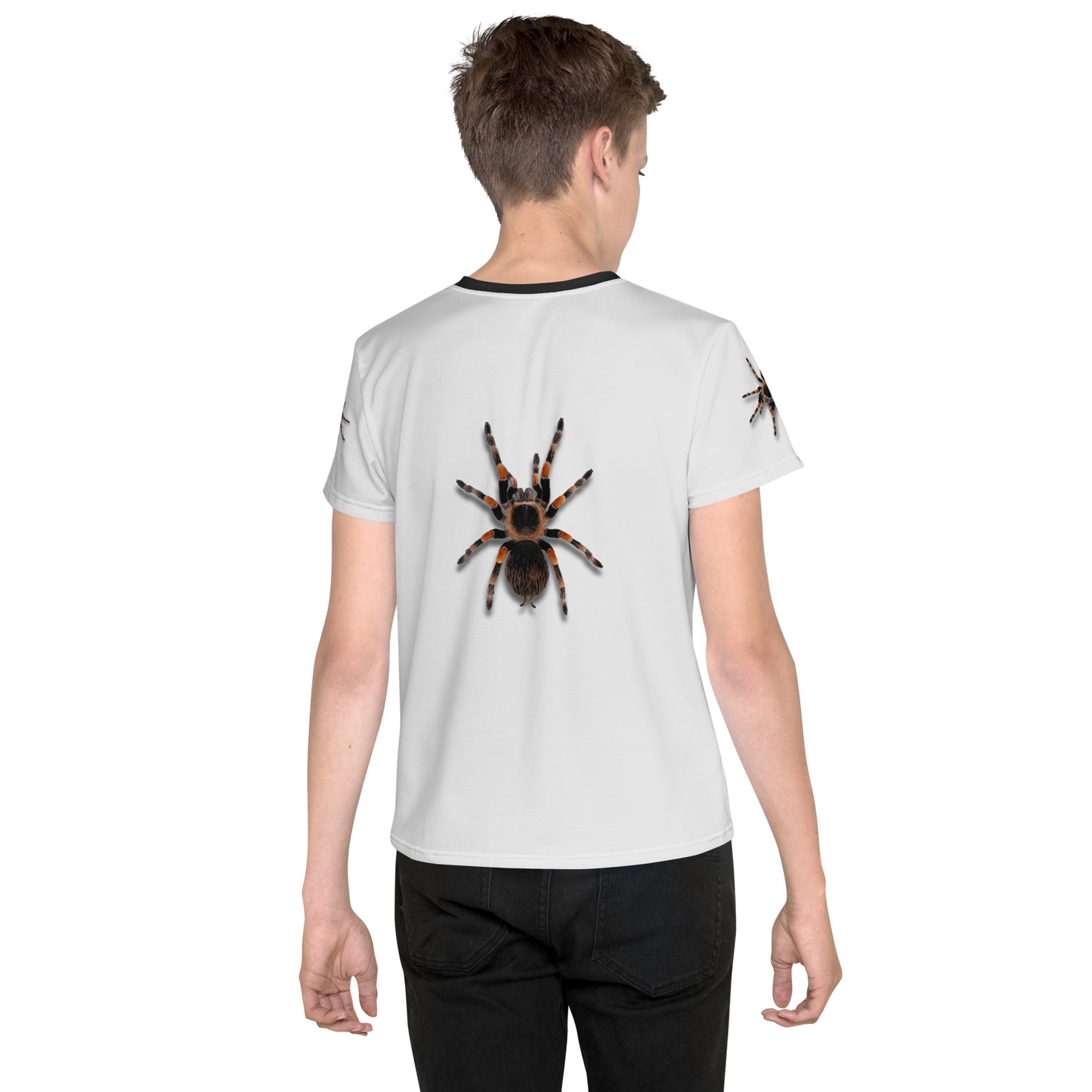 Teenage boy wearing a 3D Tarantula spider T-shirt, rear view