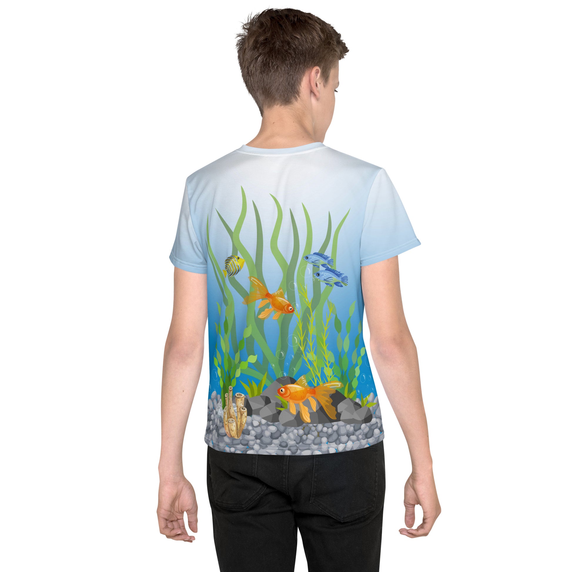 Teenage boy wearing an all over print tropical fish aquarium scene T-shirt, rear view.