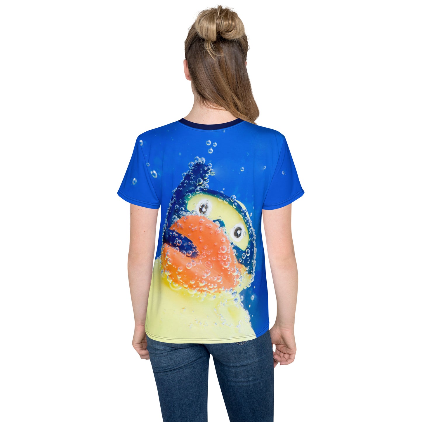 Teenage girl wearing an All over print Rubber Duck Snorkelling Underwater T-shirt, rear view.