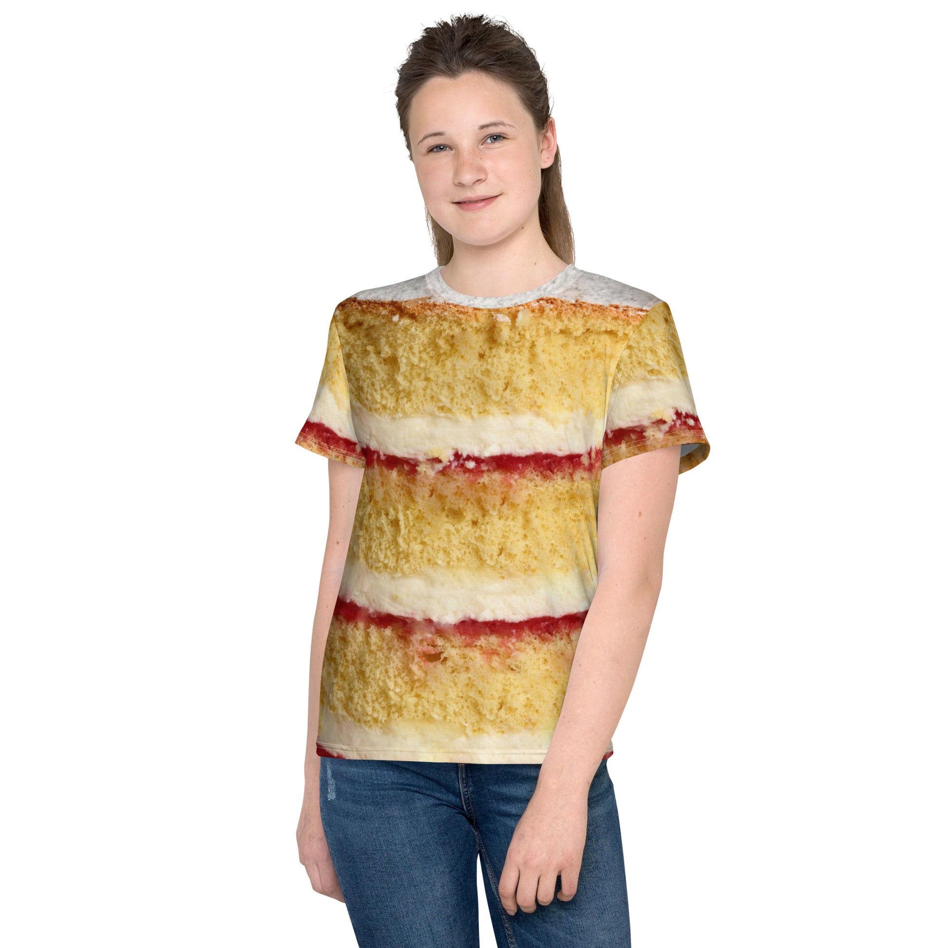 Teenage girl wearing a Youth Victoria Sponge Cake layers all over print T-shirt front view