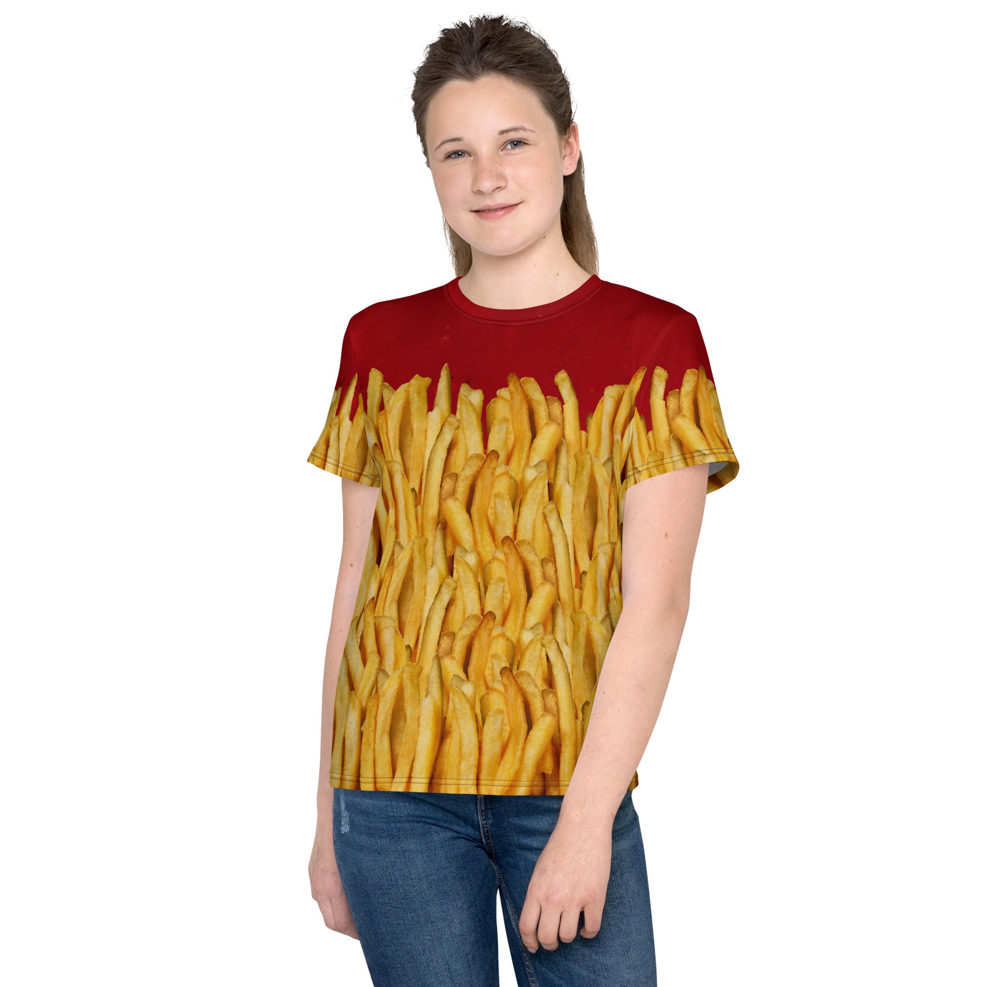 Teenage girl wearing a french fries and ketchup all over print T-shirt, facing forward.