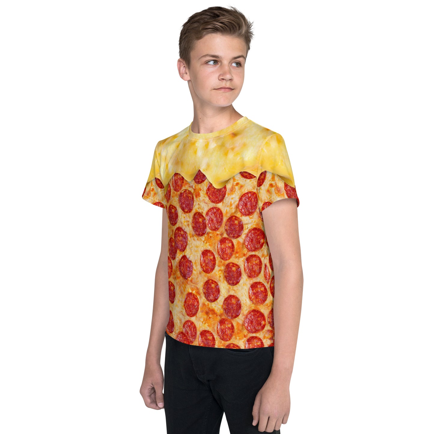 Teenage boy wearing a pepperoni pizza all over print t-shirt with cheese melting over his shoulders, front left view