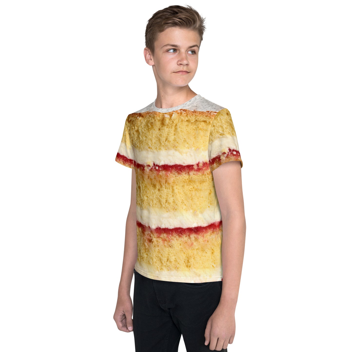 Teenage boy wearing a Victoria Sponge Cake layers all over print T-shirt, front left view