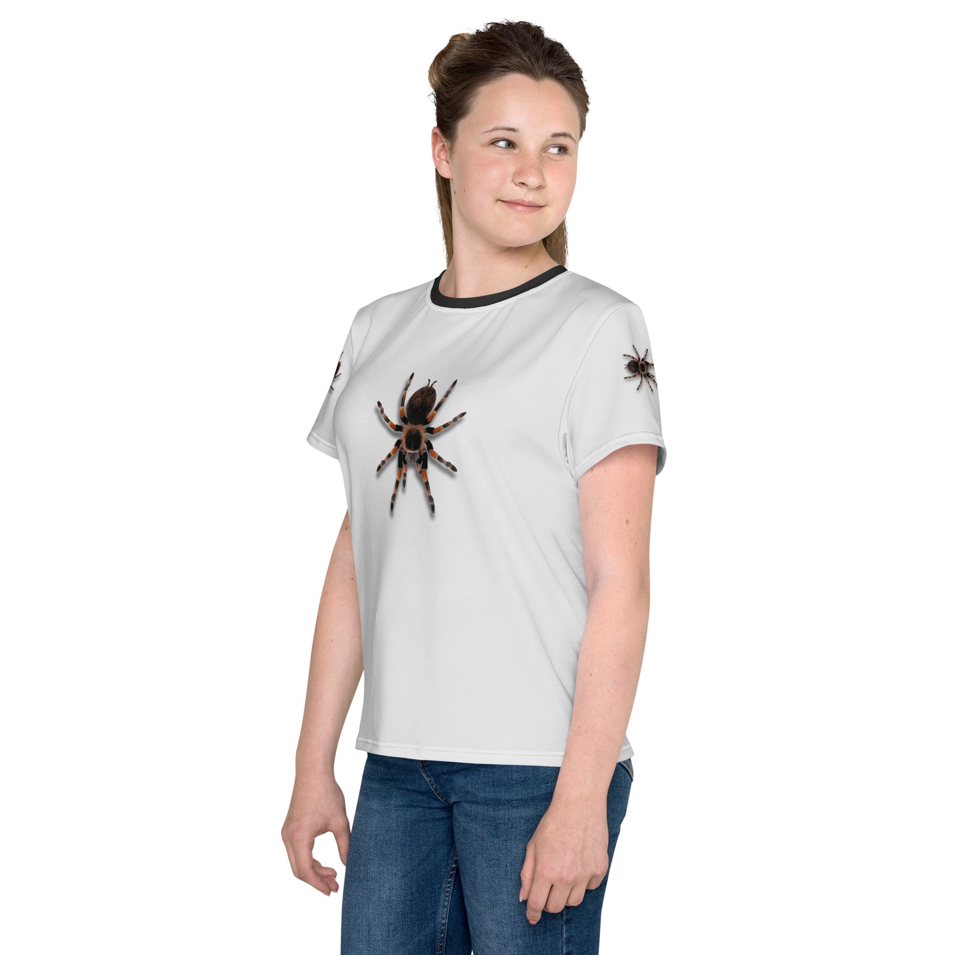 Teenage girl wearing a 3D Tarantula spider T-shirt, front left view