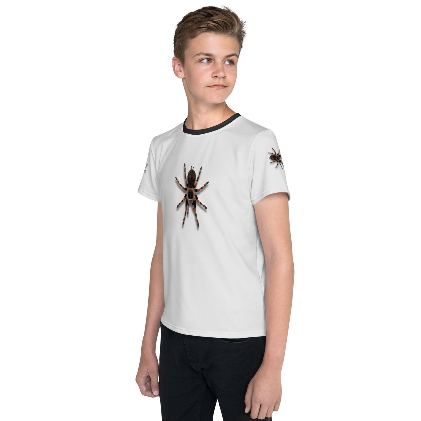 Teenage boy wearing a 3D Tarantula spider T-shirt, front left view