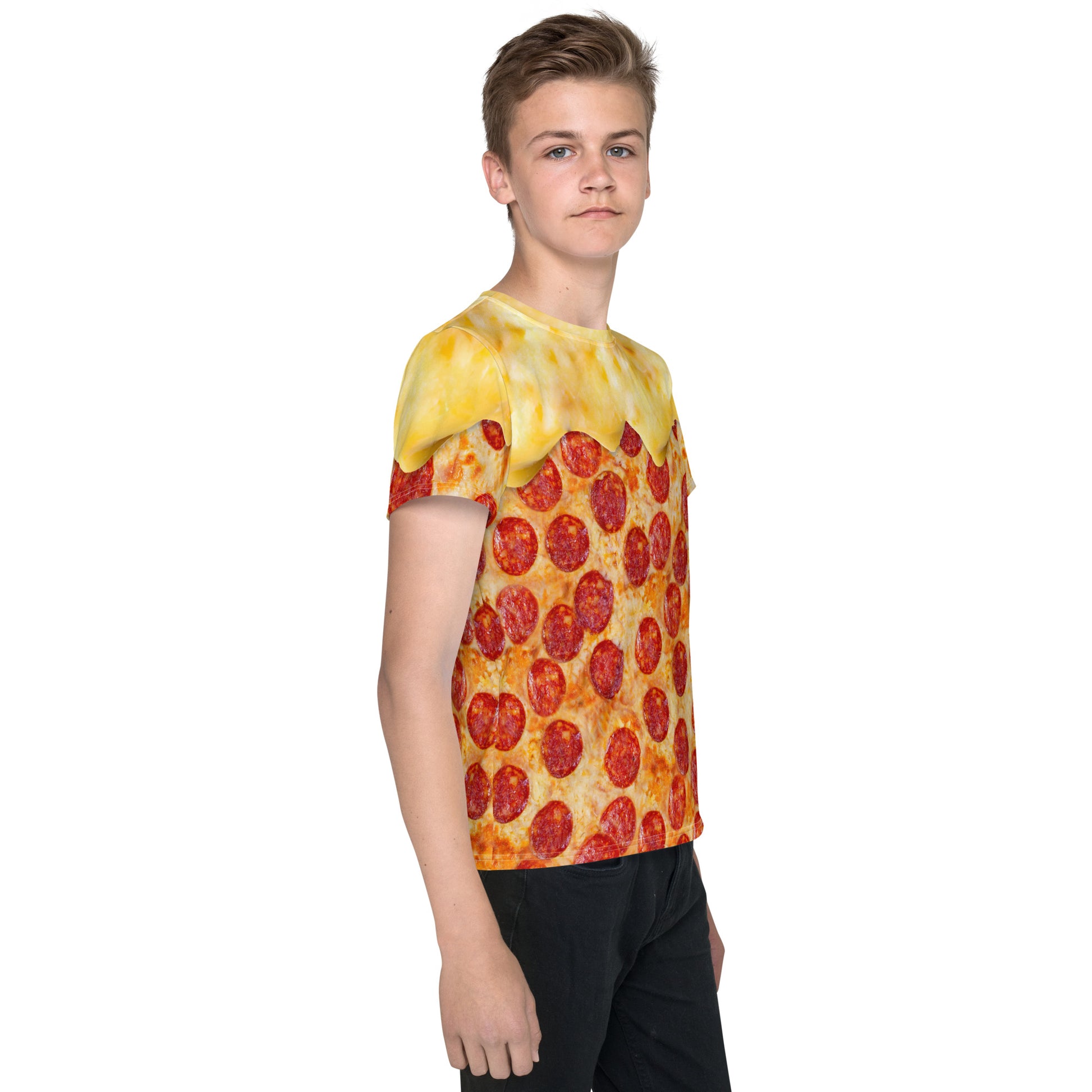 Teenage boy wearing a pepperoni pizza all over print t-shirt with cheese melting over his shoulders, front right view