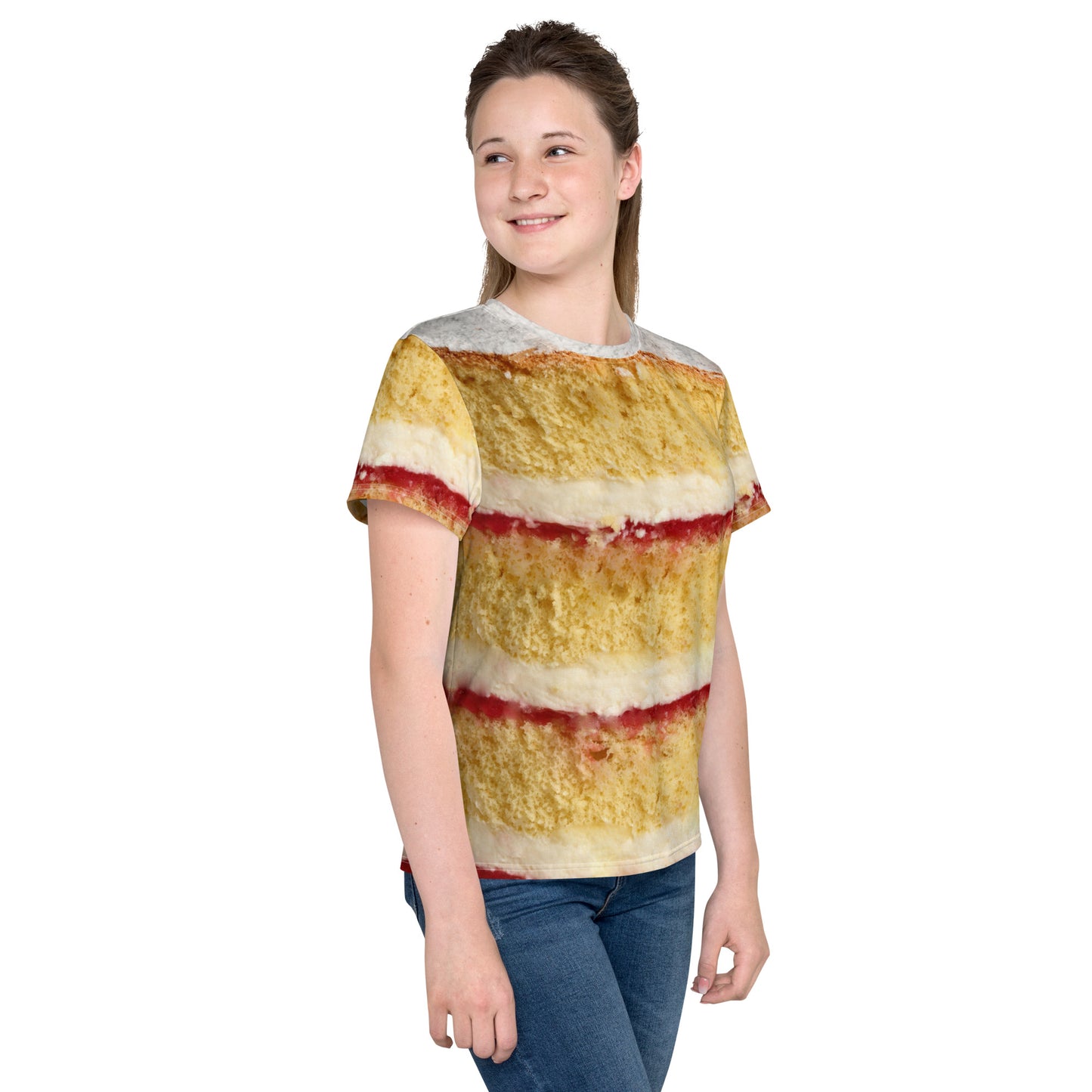 Teenage girl wearing a Youth Victoria Sponge Cake layers all over print T-shirt front right view